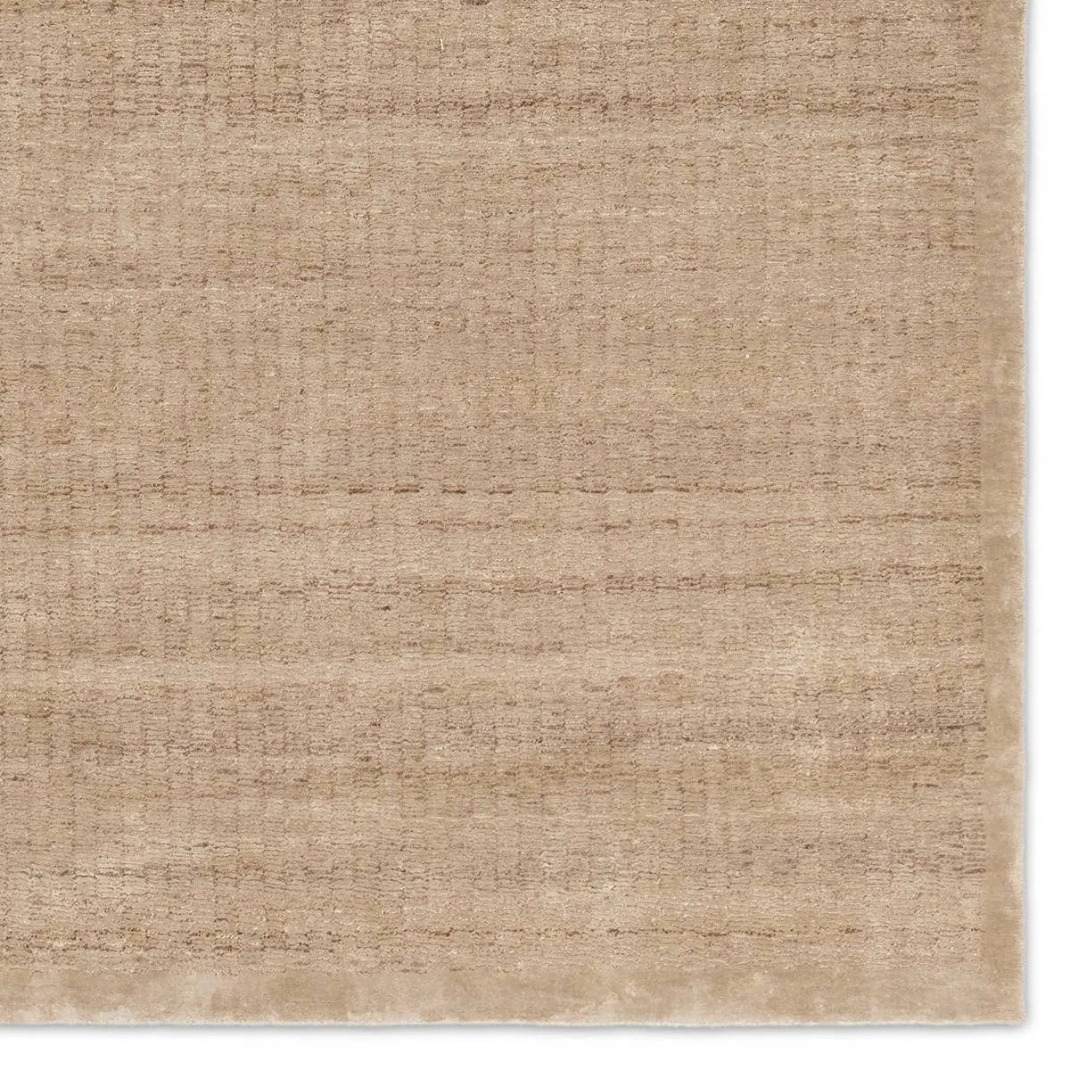 Featuring Theoros Panacea Hand-Knotted Rug by Jaipur Living at Amethyst Home. Discover the unique charm of the Theoros Panacea, where the interplay of silk and nettle creates a truly distinctive addition to any room. Both fibers offer unique qualities, and a blend of these materials provides a balance that appeals to those seeking a rug with a mix of luxury. Amethyst Home provides interior design, new home construction design consulting, vintage area rugs, and lighting in the San Diego metro area.