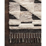 Featuring Khalid Natural/Black Hand-Knotted Rug by Loloi at Amethyst Home. A nod to timeless Moroccan style, the Khalid Collection is hand-knotted in India by skilled artisans. The soft pile features 100% natural, undyed wool, lending slight variations in tones that make each piece it's own. Plus, each rug is finished with a thoughtfully designed fringe.
Hand .  Amethyst Home provides interior design, new home construction design consulting, vintage area rugs, and lighting in the Tampa metro area.