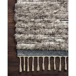 Featuring Khalid Pewter/Ink Hand-Knotted Rug by Loloi at Amethyst Home. A nod to timeless Moroccan style, the Khalid Pewter/Ink Area rug is hand-knotted in India by skilled artisans. The soft pile features 100% natural, undyed wool, lending slight variations in tones that make each piece it's own. Plus, each rug is finished with a thoughtfully designed fringe.  Amethyst Home provides interior design, new home construction design consulting, vintage area rugs, and lighting in the Austin metro area.