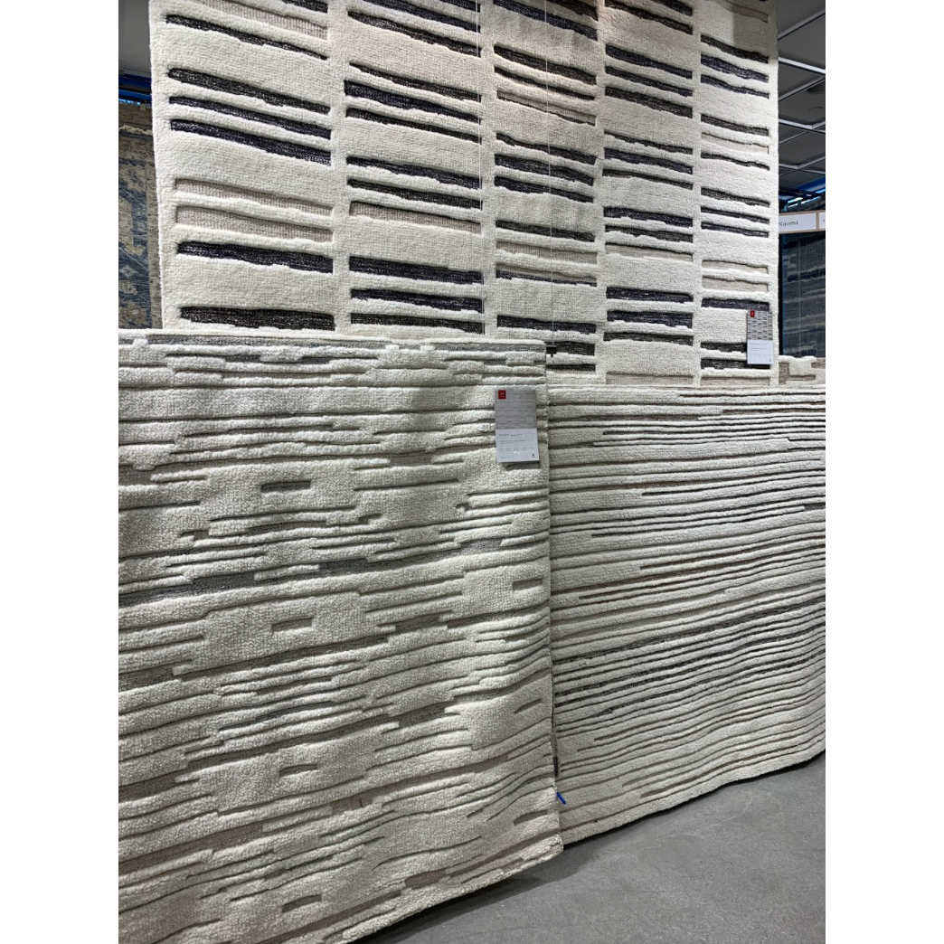 Featuring Bennett Ivory / Pebble Hand-Knotted Rug by Loloi at Amethyst Home. Dimensional yet soft, the Bennett Ivory / Pebble Area Rug is hand-knotted of wool, viscose and polyester in India. Featuring a new carve like high-low pile, Bennett has an ivory base with abstract tonal designs. Plus, it's plush underfoot-- a great choice for your office, bedroom, or.  Amethyst Home provides interior design, new home construction design consulting, vintage area rugs, and lighting in the Dallas metro area.