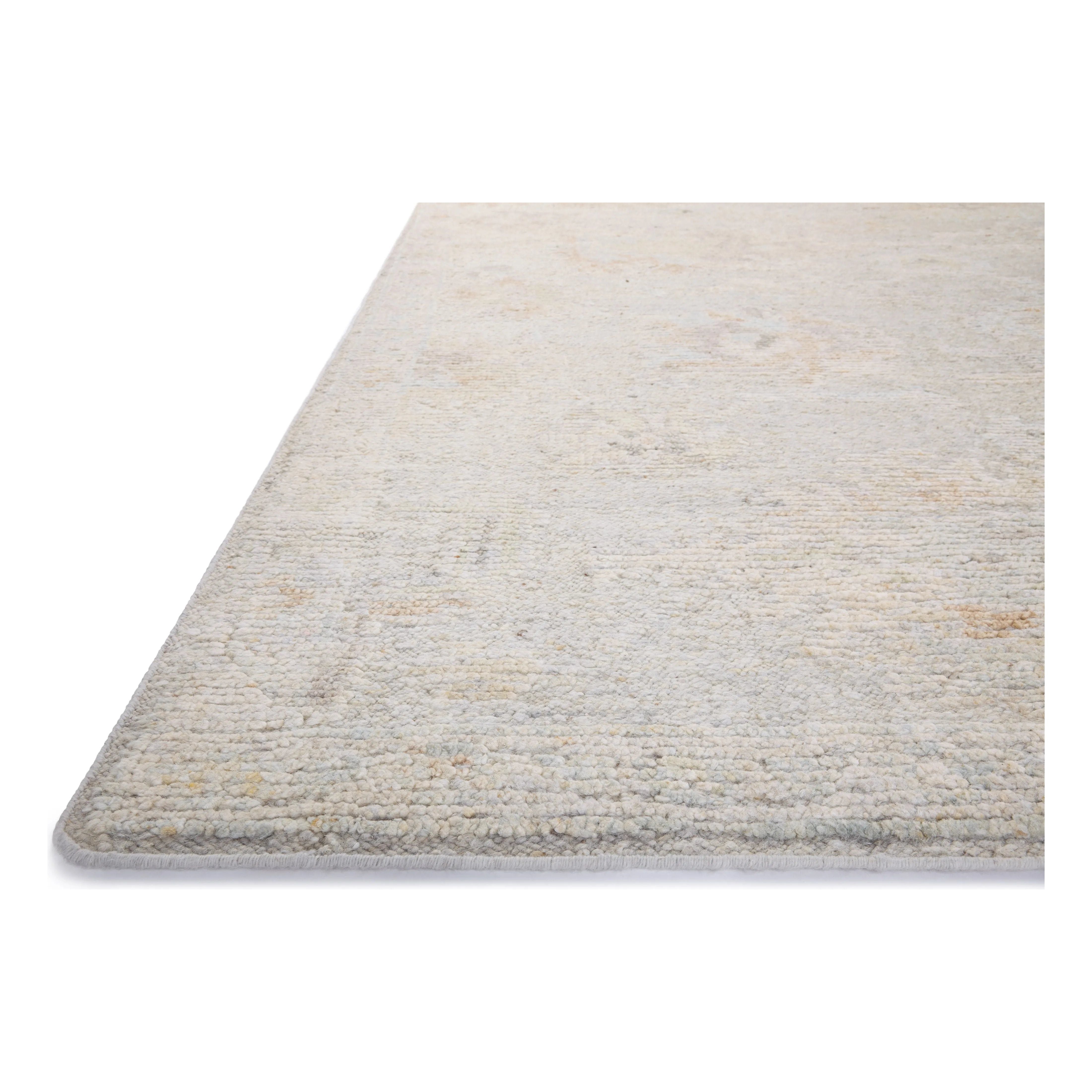 Featuring Adelaide Mist / Multi Hand-Knotted Rug by Loloi at Amethyst Home. The Adelaide Collection is a cool-toned area rug with asymmetrical motifs that float across the soft wool surface. Restrained in color and dynamic in texture, Adelaide’s variable pile height adds subtle dimension as the light changes throughout the day. Hand-knotted by artisans in Ind. Amethyst Home provides interior design, new home construction design consulting, vintage area rugs, and lighting in the Omaha metro area.