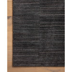 Featuring Amber Lewis x Loloi Lou Charcoal Rug by Loloi at Amethyst Home. Sleek and modern, the Lou Collection is a luxurious hand-loomed area rug by Amber Lewis x Loloi. While the rug presents a minimal aesthetic, up close, it has a broken stripe pattern that creates a slightly ribbed effect. It’s made with a blend of wool and viscose that’s soft and durab. Amethyst Home provides interior design, new home construction design consulting, vintage area rugs, and lighting in the Calabasas metro area.