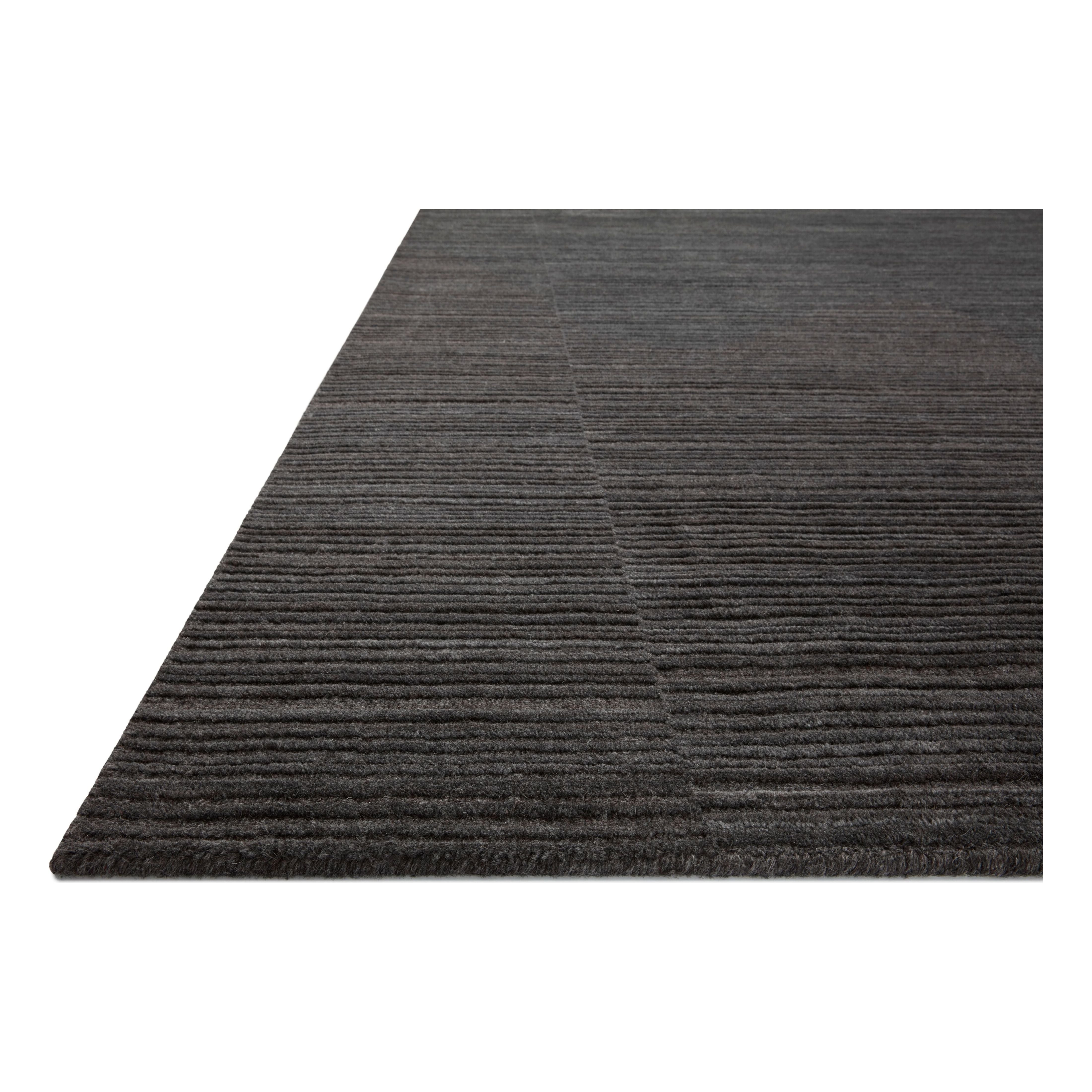 Featuring Amber Lewis x Loloi Lou Charcoal Rug by Loloi at Amethyst Home. Sleek and modern, the Lou Collection is a luxurious hand-loomed area rug by Amber Lewis x Loloi. While the rug presents a minimal aesthetic, up close, it has a broken stripe pattern that creates a slightly ribbed effect. It’s made with a blend of wool and viscose that’s soft and durab. Amethyst Home provides interior design, new home construction design consulting, vintage area rugs, and lighting in the Nashville metro area.