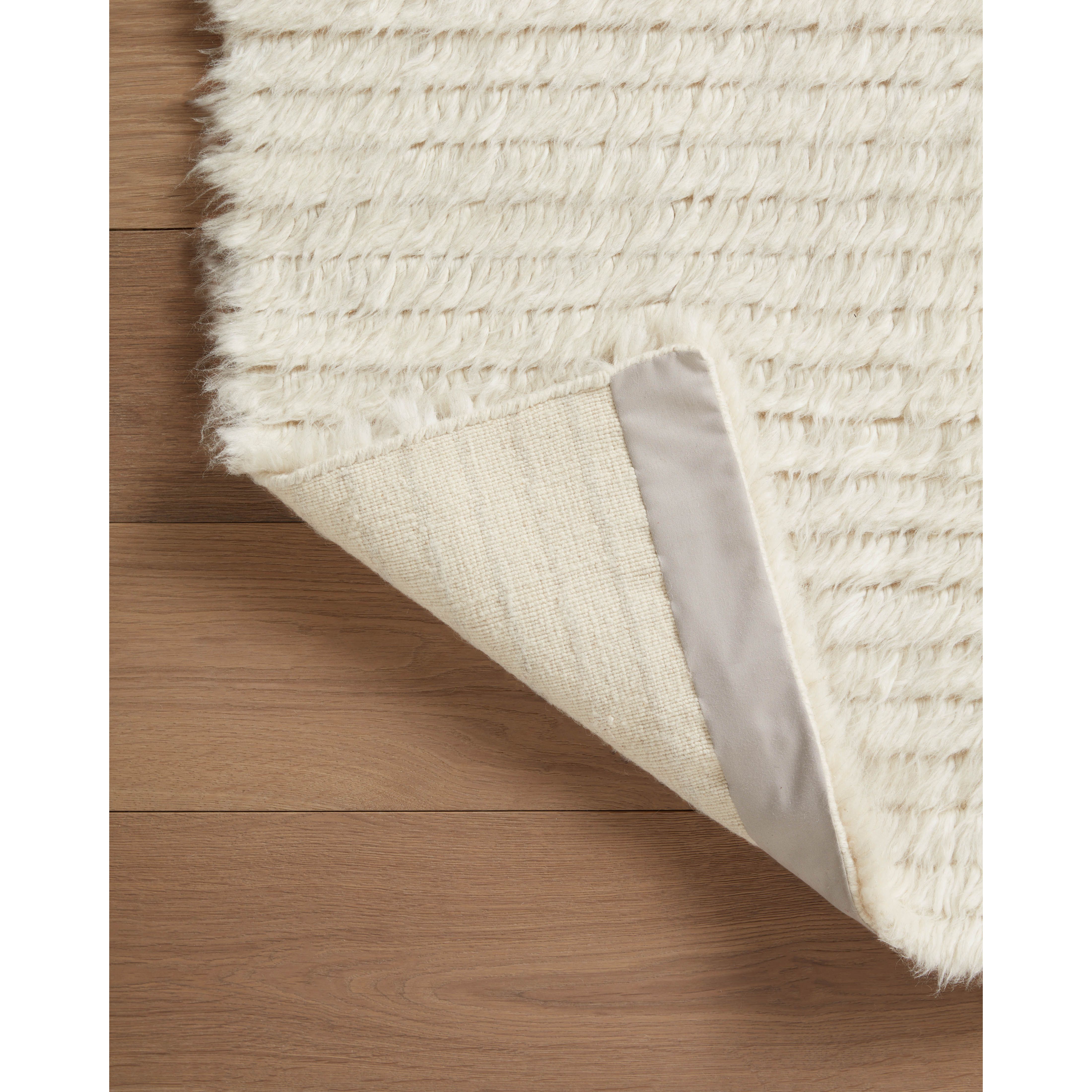 Featuring Amber Lewis x Loloi Woodland Ivory Rug by Loloi at Amethyst Home. The Amber Lewis x Loloi Woodland Ivory Rug has a lush, soft pile inspired by the tree-lined city of Woodland, California. A slightly ridged construction adds dimension and movement to this stylish, modern rug. Hand-knotted by artisans in India, the Woodland Collection is GoodWeave certified, ensuring our commitment to e. Amethyst Home provides interior design services, furniture, rugs, and lighting in the Omaha metro area.
