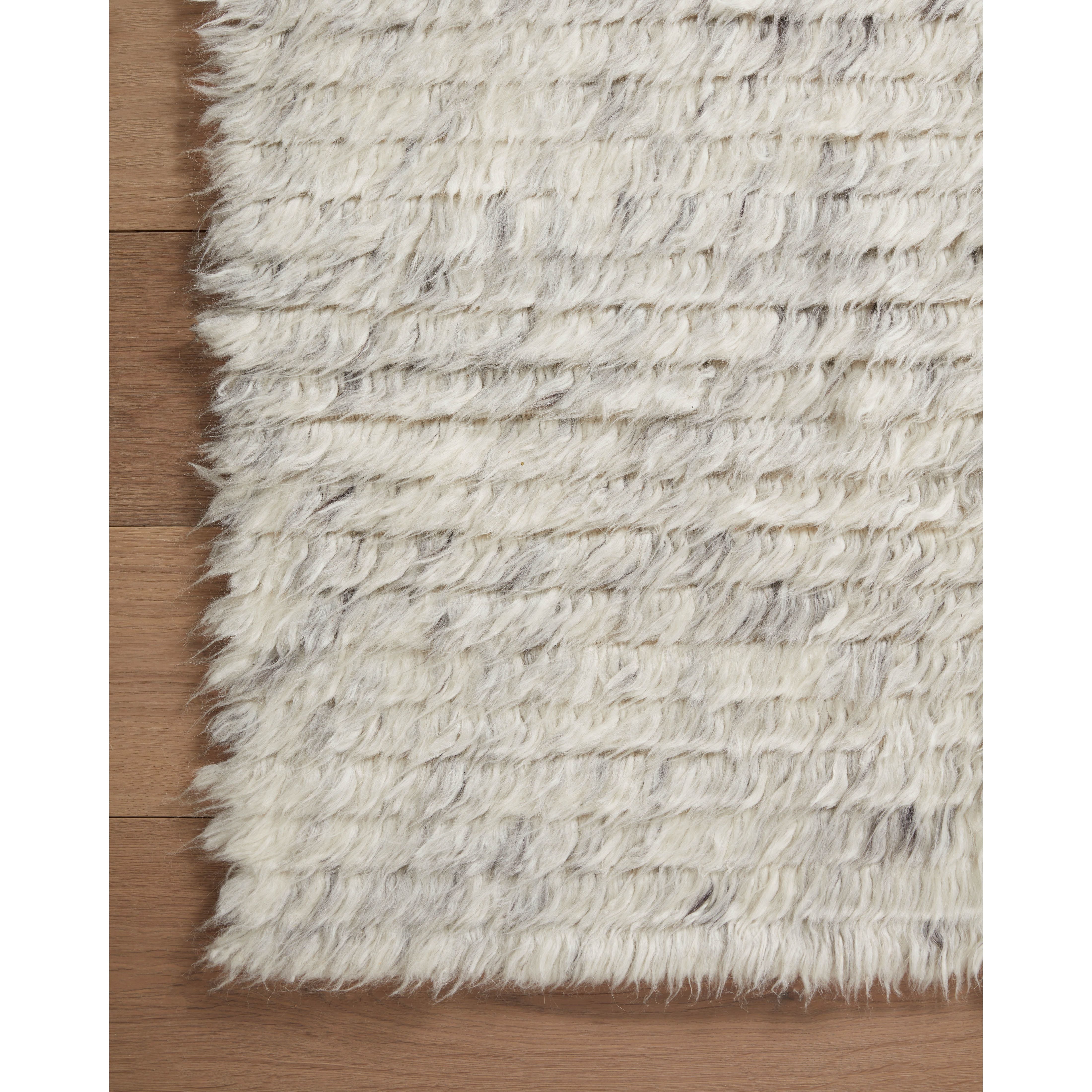 Featuring Amber Lewis x Loloi Woodland Silver Rug by Loloi at Amethyst Home. The Amber Lewis x Loloi Woodland Silver Rug has a lush, soft pile inspired by the tree-lined city of Woodland, California. A slightly ridged construction adds dimension and movement to this stylish, modern rug. Hand-knotted by artisans in India, the Woodland Collection is GoodWeave certified, ensuring our commitme. Amethyst Home provides interior design services, furniture, rugs, and lighting in the Des Moines metro area.