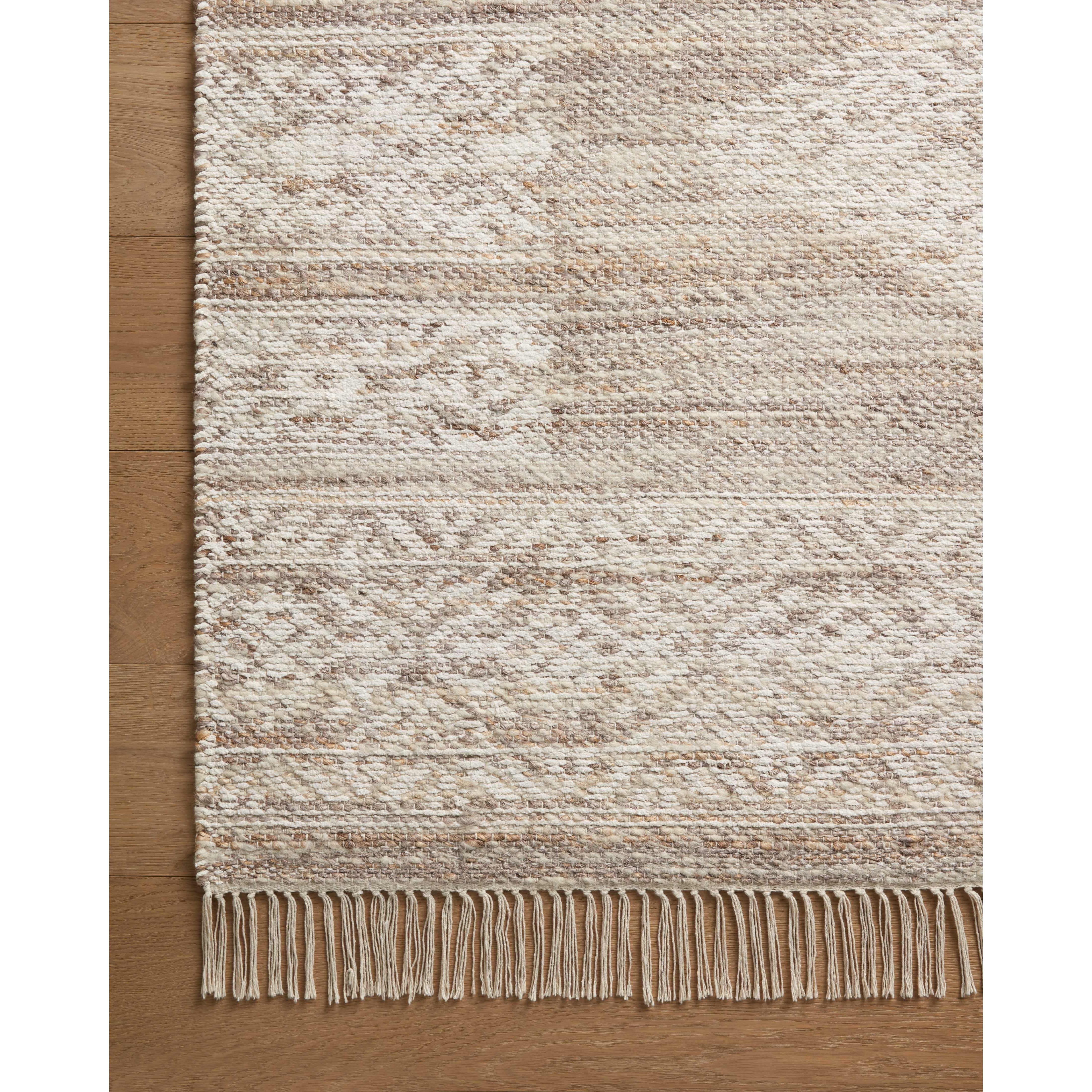 Featuring Angela Rose x Loloi Rivers Lilac / Ivory Rug by Loloi at Amethyst Home. The Rivers Lilac / Ivory rug by Angela Rose x Loloi is a modern flatweave area rug with a reversible design featuring symmetrical motifs. Woven of wool, cotton, and jute, Rivers combines natural materials with an airy, natural aesthetic. The soft colors of the rug create a water. Amethyst Home provides interior design, new home construction design consulting, vintage area rugs, and lighting in the Seattle metro area.