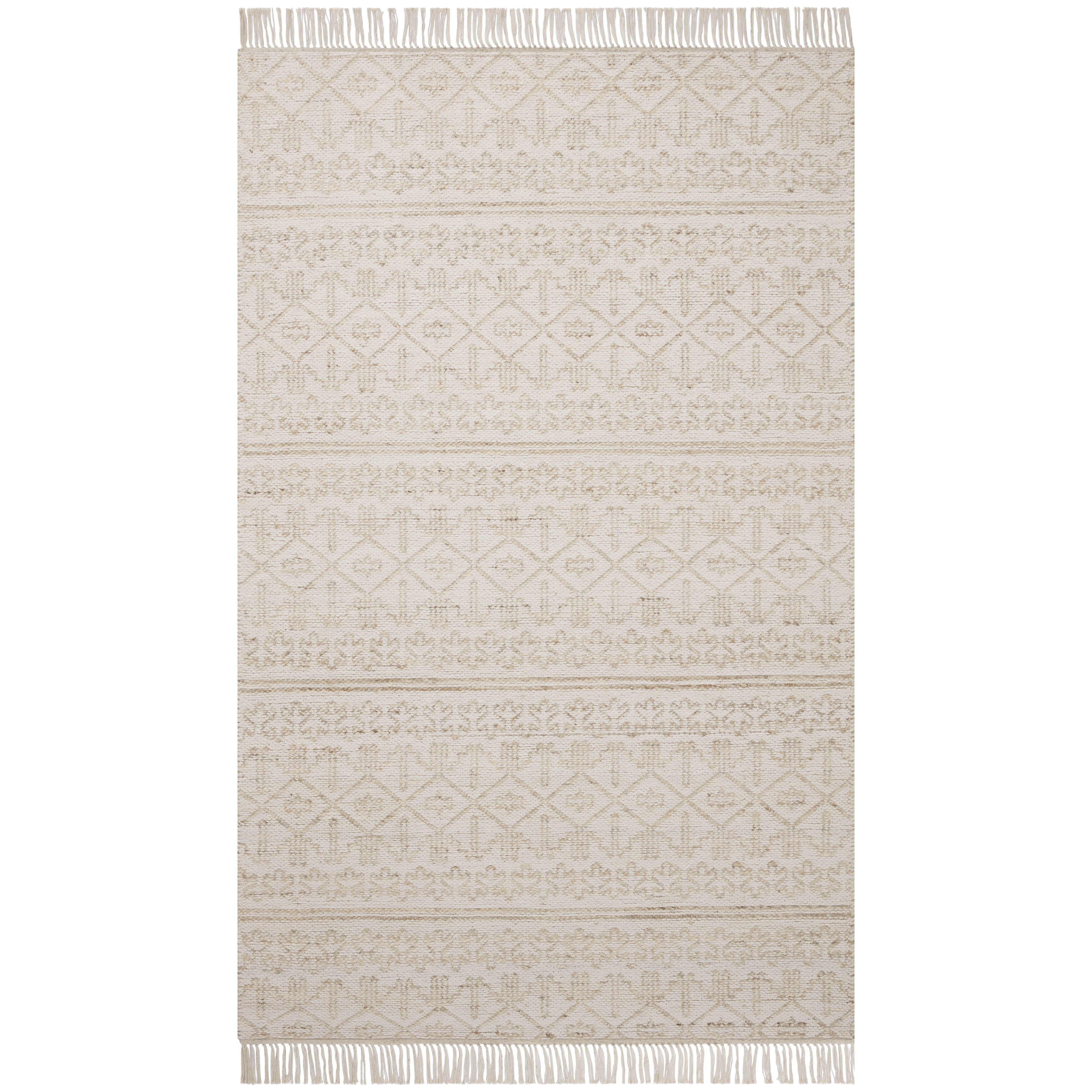 Featuring Angela Rose x Loloi Rivers Sand / Ivory Rug by Loloi at Amethyst Home. The Rivers Sand / Ivory rug by Angela Rose x Loloi is a modern flatweave area rug with a reversible design featuring symmetrical motifs. Woven of wool, cotton, and jute, Rivers combines natural materials with an airy, natural aesthetic. The soft colors of the rug create a waterco. Amethyst Home provides interior design, new home construction design consulting, vintage area rugs, and lighting in the Houston metro area.
