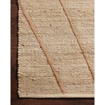 Featuring Bodhi Ivory / Natural BOD-02 Rug by Loloi at Amethyst Home. A tonal approach to Moroccan-inspired rugs, the Bodhi Ivory / Natural rug from Loloi is hand-woven of 100% jute by skilled artisans. This rug features linear and braided details, creating natural variations that make a subtle yet striking statement.
The Bodhi rug would be a great addition for an entryway, living ro. Amethyst Home provides interior design, new construction, custom furniture, and rugs for the Nashville metro area.