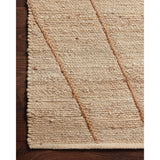 Featuring Bodhi Ivory / Natural BOD-02 Rug by Loloi at Amethyst Home. A tonal approach to Moroccan-inspired rugs, the Bodhi Ivory / Natural rug from Loloi is hand-woven of 100% jute by skilled artisans. This rug features linear and braided details, creating natural variations that make a subtle yet striking statement.
The Bodhi rug would be a great addition for an entryway, living ro. Amethyst Home provides interior design, new construction, custom furniture, and rugs for the Nashville metro area.