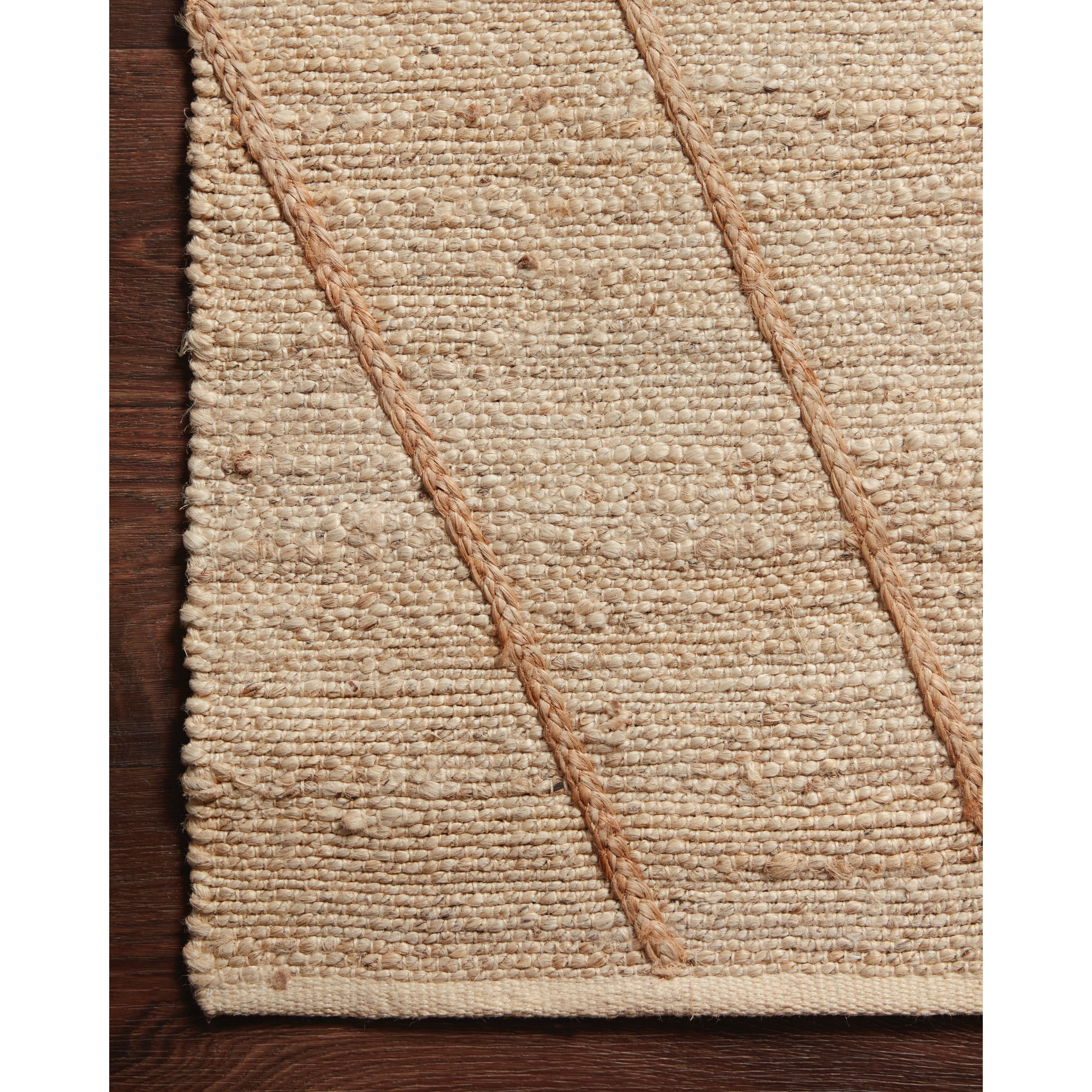 Featuring Bodhi Ivory / Natural BOD-02 Rug by Loloi at Amethyst Home. A tonal approach to Moroccan-inspired rugs, the Bodhi Ivory / Natural rug from Loloi is hand-woven of 100% jute by skilled artisans. This rug features linear and braided details, creating natural variations that make a subtle yet striking statement.
The Bodhi rug would be a great addition for an entryway, living ro. Amethyst Home provides interior design, new construction, custom furniture, and rugs for the Nashville metro area.