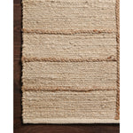 Featuring Bodhi Ivory / Natural BOD-04 Rug by Loloi at Amethyst Home. A tonal approach to Moroccan-inspired rugs, the Bodhi Ivory / Natural rug from Loloi is hand-woven of 100% jute by skilled artisans. This rug features linear and braided details, creating natural variations that make a subtle yet striking statement.
The Bodhi rug would be a great addition for an entryway, living ro. Amethyst Home provides interior design, new construction, custom furniture, and rugs for the Nashville metro area.