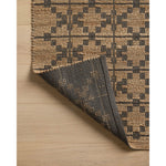 Featuring Chris Loves Julia x Loloi Judy Natural / Graphite Rug by Loloi at Amethyst Home. Hand Woven76% Jute l 24% CottonJUD-05 Natural / GraphitePile Height: 0.5". Amethyst Home provides interior design, new home construction design consulting, vintage area rugs, and lighting in the Tampa metro area.