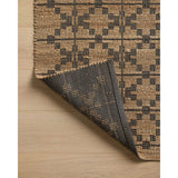 Featuring Chris Loves Julia x Loloi Judy Natural / Graphite Rug by Loloi at Amethyst Home. Hand Woven76% Jute l 24% CottonJUD-05 Natural / GraphitePile Height: 0.5". Amethyst Home provides interior design, new home construction design consulting, vintage area rugs, and lighting in the Tampa metro area.