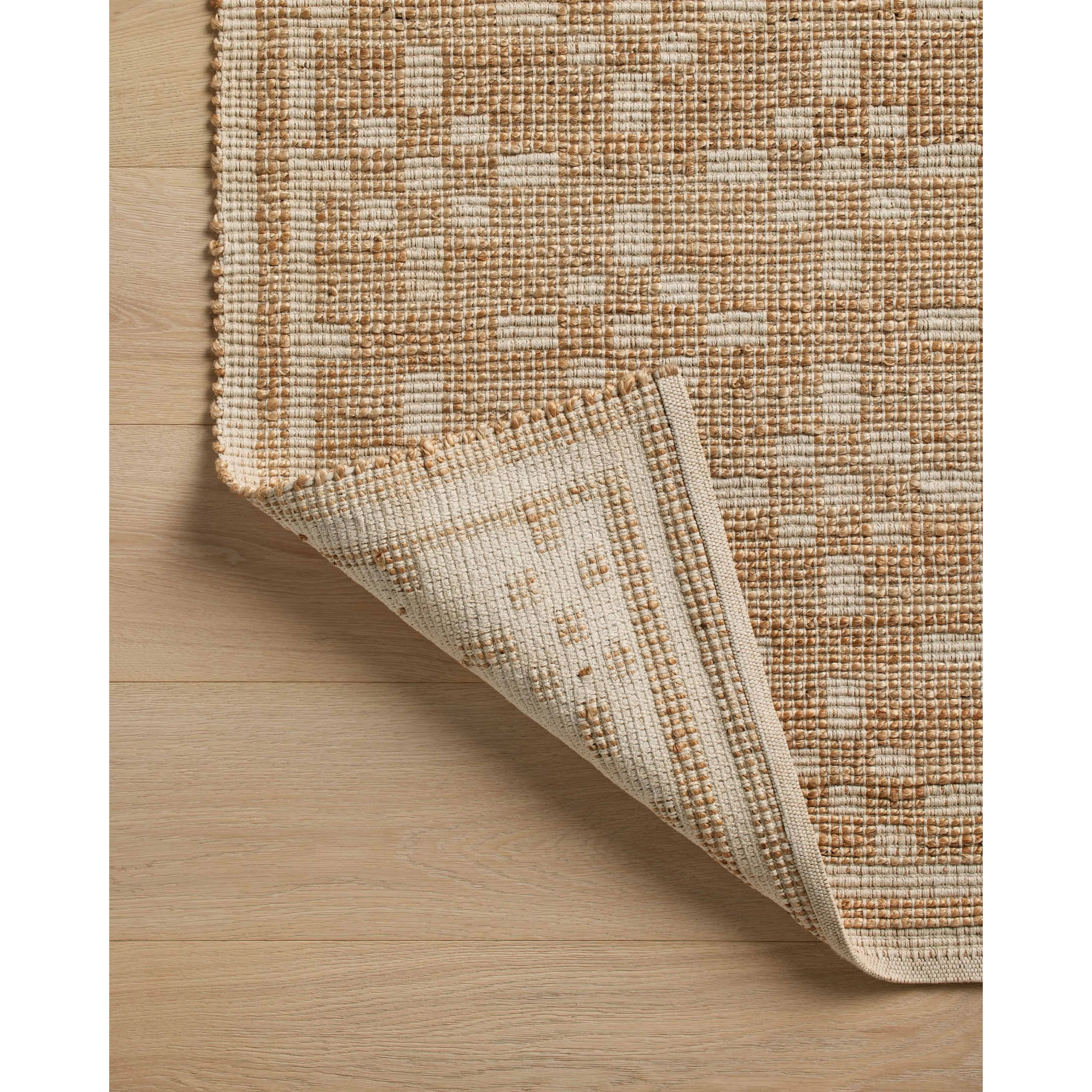 Featuring Chris Loves Julia x Loloi Judy Natural / Ivory Rug by Loloi at Amethyst Home. Soft texture meets fresh appeal in this signature rug collaboration from Chris Loves Julia and Loloi. This rug is handmade with a striking geometric pattern that grounds its minimalist motifs in natural tones. The jute-forward blend offers a supple yet sturdy tread for . Amethyst Home provides interior design, new home construction design consulting, vintage area rugs, and lighting in the Des Moines metro area.