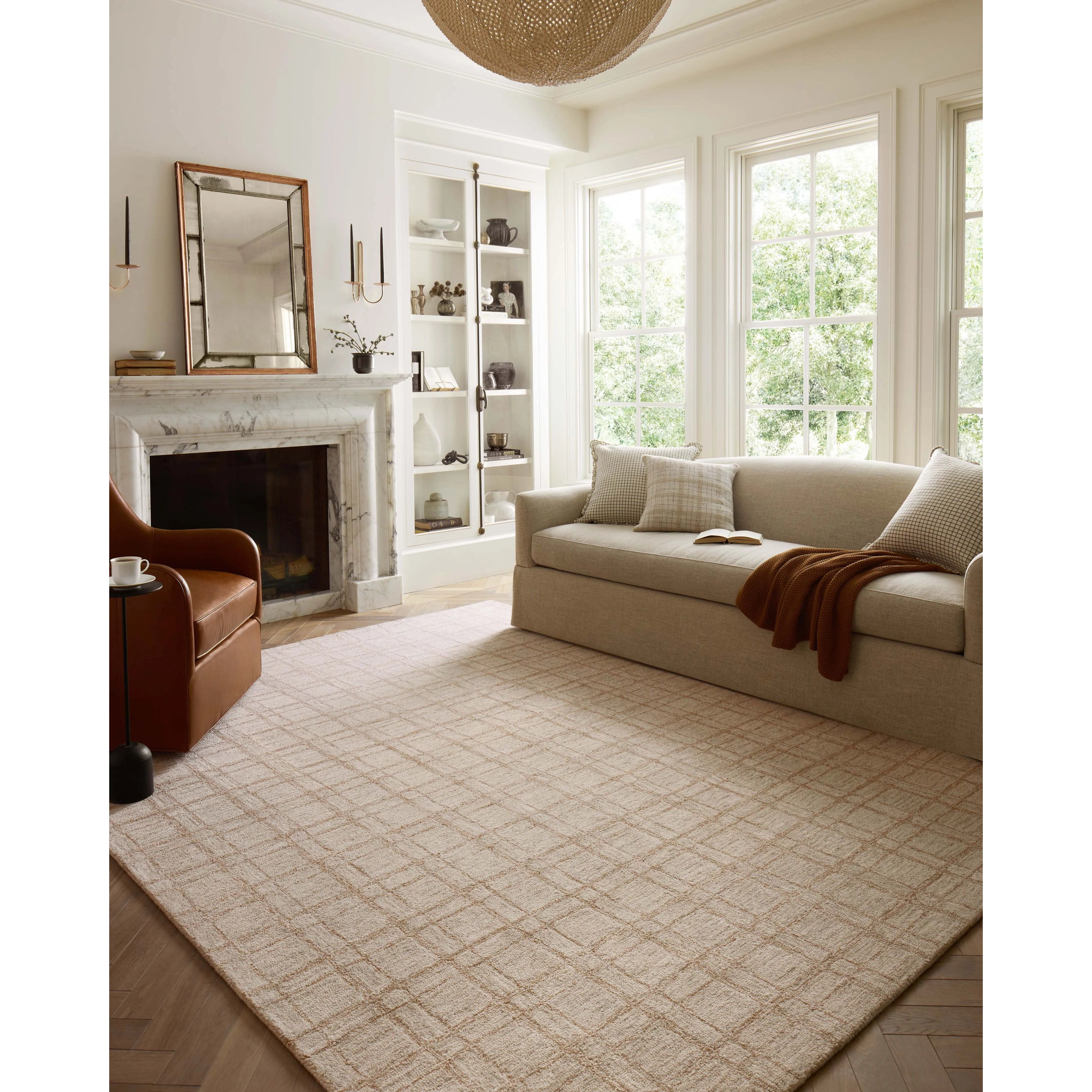 Featuring Chris Loves Julia x Loloi Polly Khaki / Sand Rug by Loloi at Amethyst Home. Hand-tufted of wool and jute pile, the Polly collection for Chris Loves Julia x Loloi brings a fresh take on modern yet classic designs. With striking gridded designs toned down by a neutral color palette, Polly is a timeless choice for any room. Polly is also GoodWeave cert. Amethyst Home provides interior design, new home construction design consulting, vintage area rugs, and lighting in the Seattle metro area.