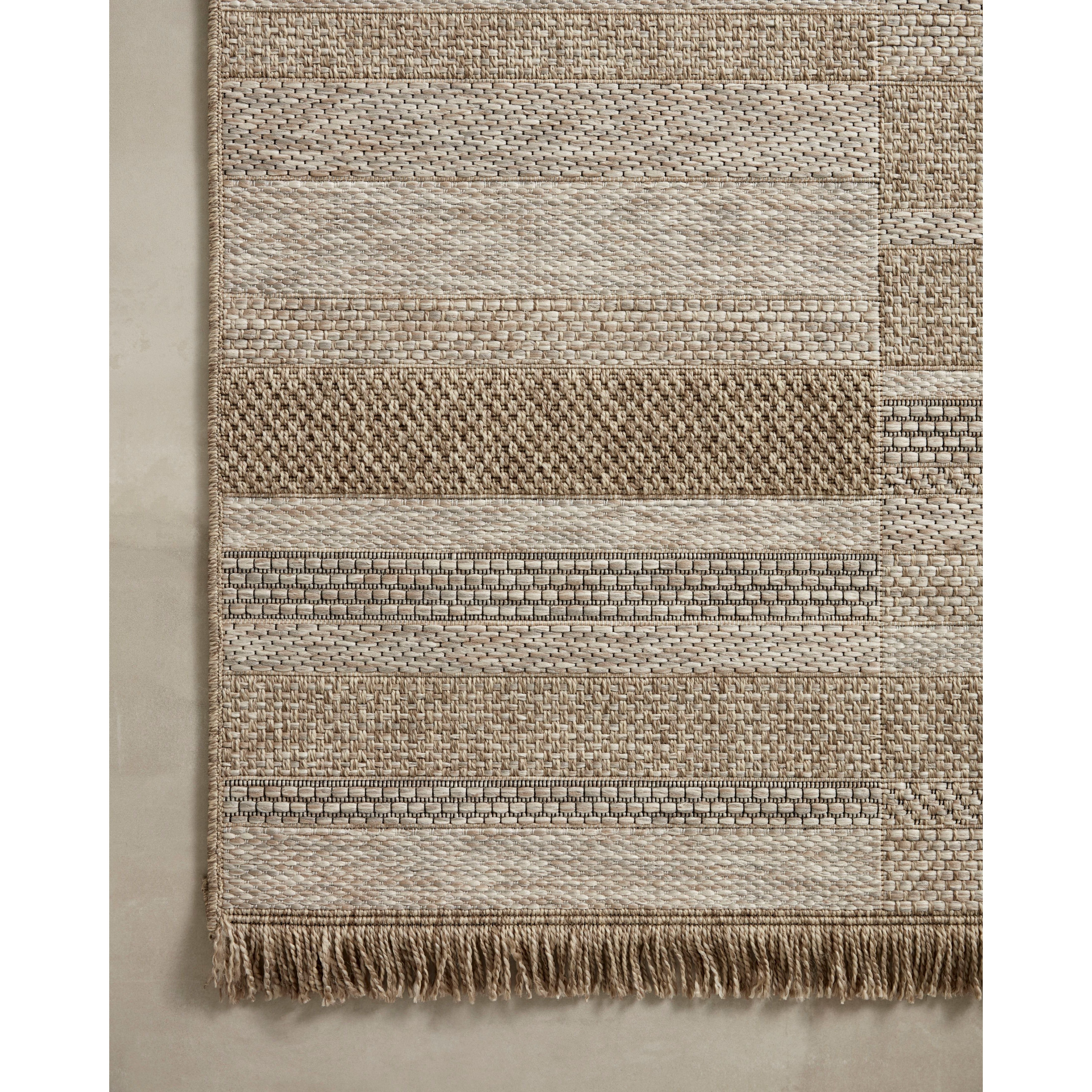 Featuring Dawn Natural DAW-03 Indoor/Outdoor Rug by Loloi at Amethyst Home. Made for sunny days ahead, the Dawn Collection is an indoor/outdoor rug that looks like a woven sisal rug but is power-loomed of 100% polypropylene, which makes it water- and mildew-resistant (so it's ready for rainy days ahead, too). Available in modern graphic patterns in tonal be. Amethyst Home provides interior design, new home construction design consulting, vintage area rugs, and lighting in the Nashville metro area.