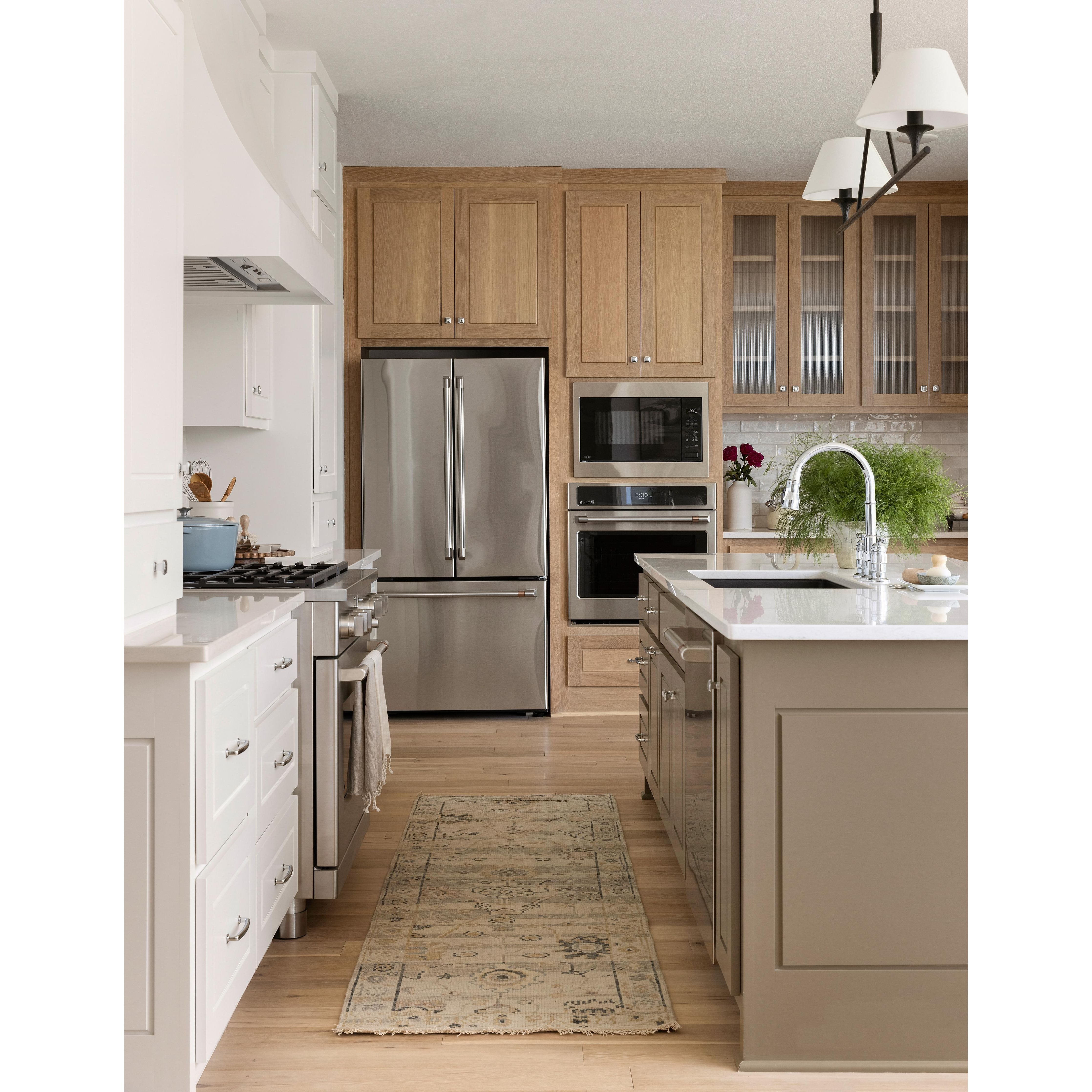 Featuring Dominic Dove / Denim Hand-Knotted Rug by Loloi at Amethyst Home. The hand-knotted Dominic Dove / Denim rug features loose, freeform motifs that give the rug a sense of depth and romance. Dominic’s shade-shifting palette is based on the horizontal lines of varying tones you’d encounter in antique Persian rugs. This GoodWeave certified collection .  Amethyst Home provides interior design, new home construction design consulting, vintage area rugs, and lighting in the Des Moines metro area.