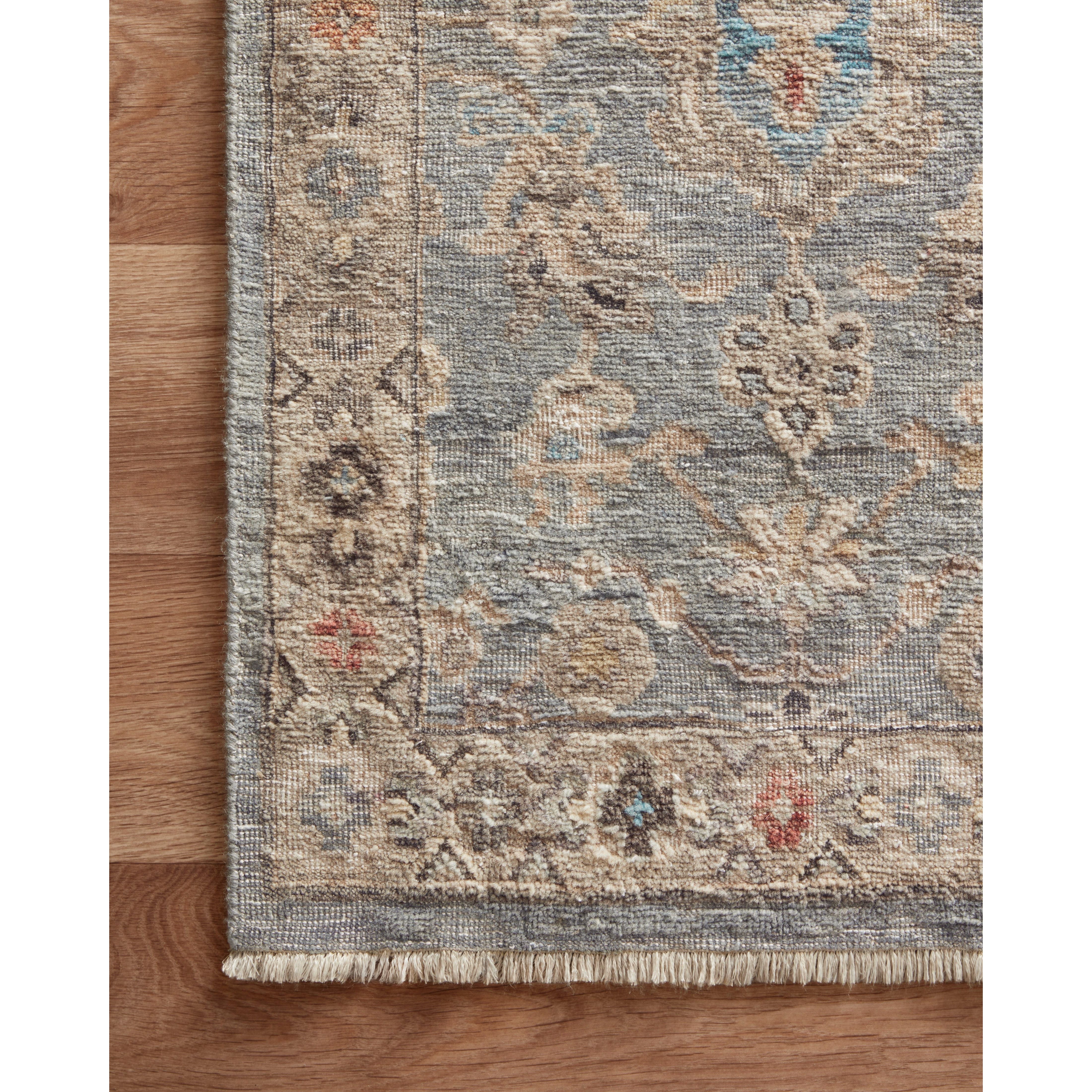 Featuring Legacy Blue / Multi Hand-Knotted Rug by Loloi at Amethyst Home. The Legacy Blue / Multi rug from Loloi is hand-knotted, refined, yet versatile for any home. The Legacy rug is deliberately distressed and sheared down to an extra low pile of 100% wool, creating a patina usually only imparted through decades of wear.
This rug features:- Beautiful vintage look and patina- Extr. Amethyst Home provides interior design, new construction, custom furniture, and rugs for the Scottsdale metro area.