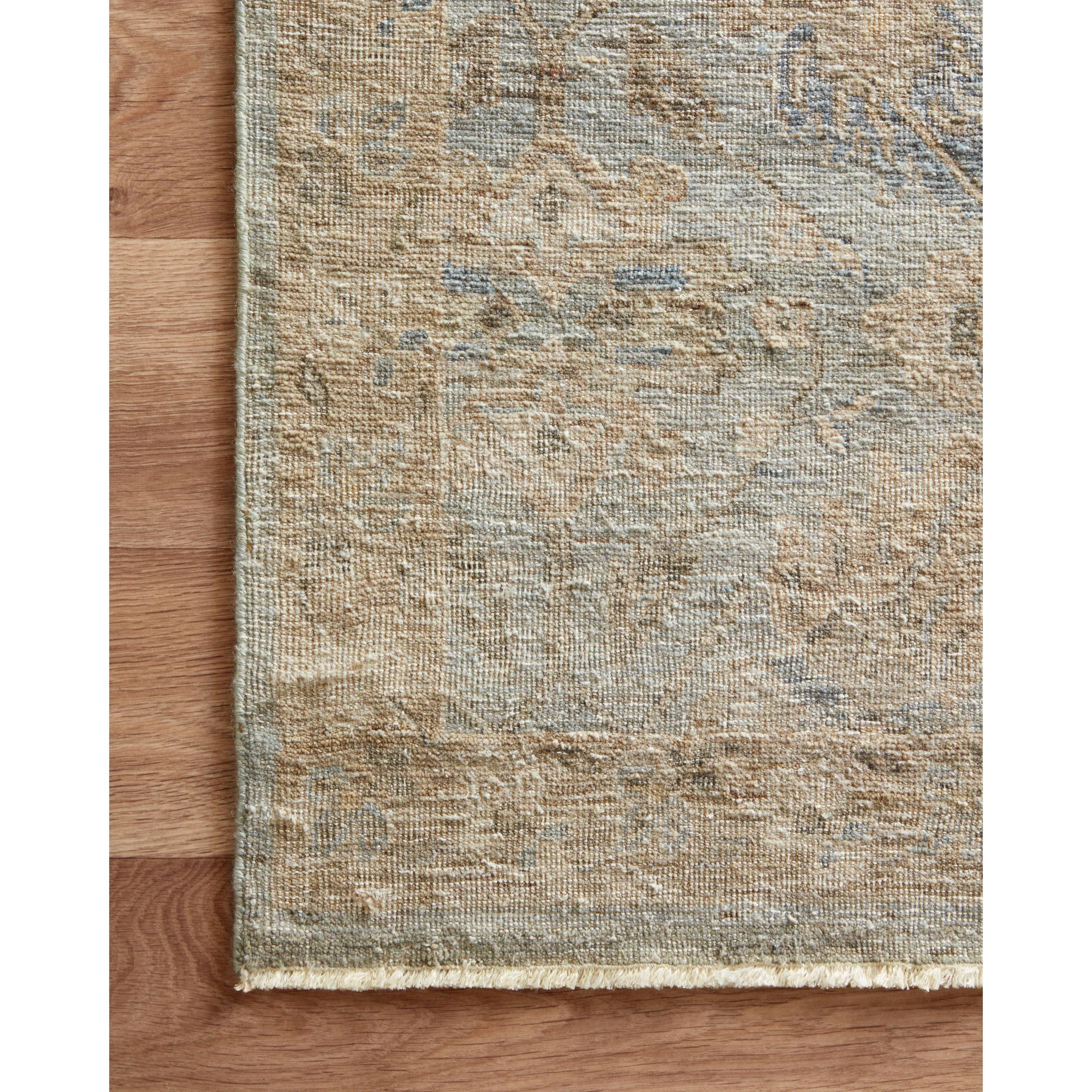 Featuring Legacy Lagoon Hand-Knotted Rug by Loloi at Amethyst Home. The Legacy Lagoon rug from Loloi is hand-knotted, refined, yet versatile for any home. The Legacy rug is deliberately distressed and sheared down to an extra low pile of 100% wool, creating a patina usually only imparted through decades of wear.
This rug features:- Beautiful vintage look and patina- Extra low pile- . Amethyst Home provides interior design, new construction, custom furniture, and rugs for the Des Moines metro area.