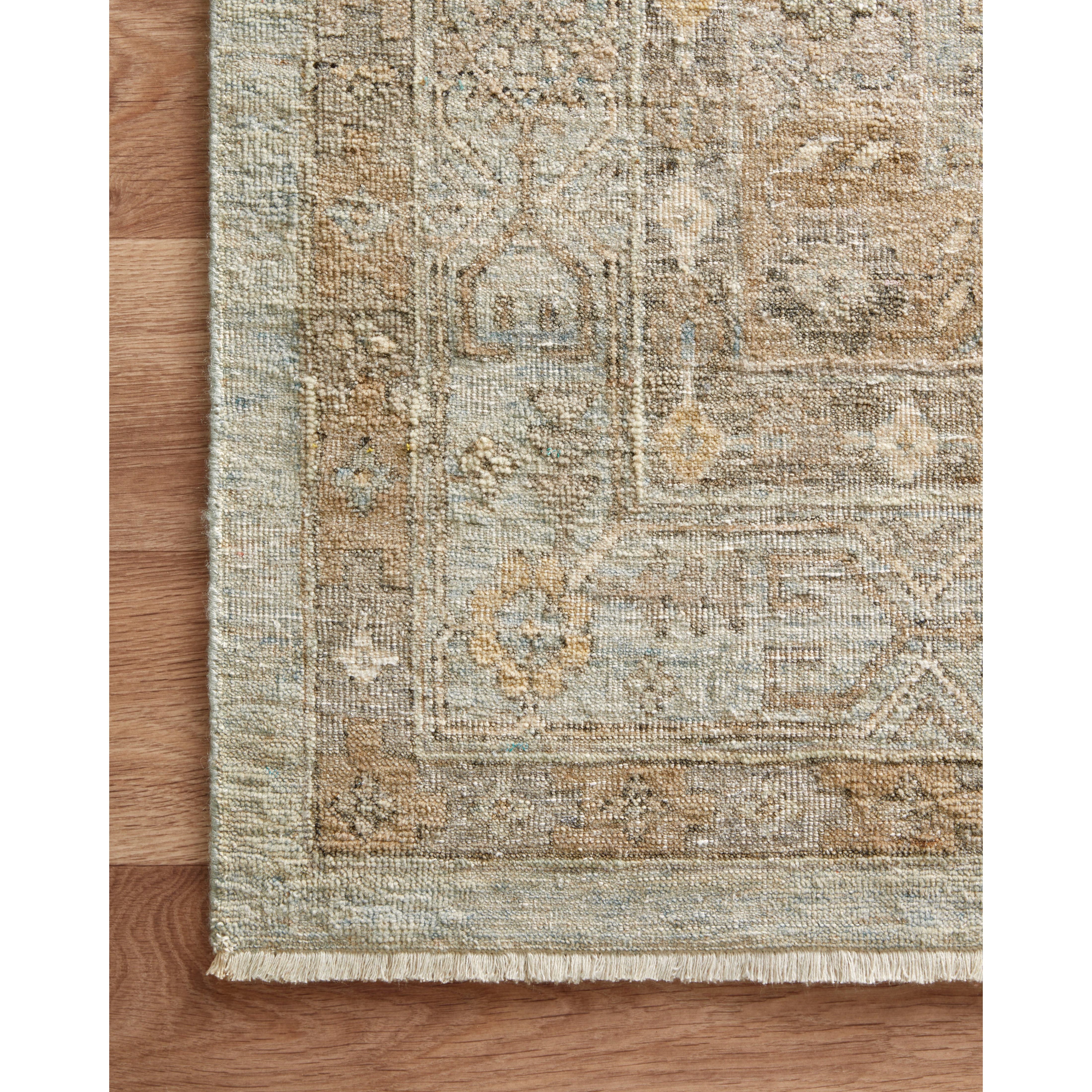 Featuring Legacy Sea/Stone Hand-Knotted Rug by Loloi at Amethyst Home. The Legacy Sea/Stone rug from Loloi is hand-knotted, refined, yet versatile for any home. The Legacy rug is deliberately distressed and sheared down to an extra low pile of 100% wool, creating a patina usually only imparted through decades of wear.
This rug features:- Beautiful vintage look and patina- Extra low . Amethyst Home provides interior design, new construction, custom furniture, and rugs for the Des Moines metro area.