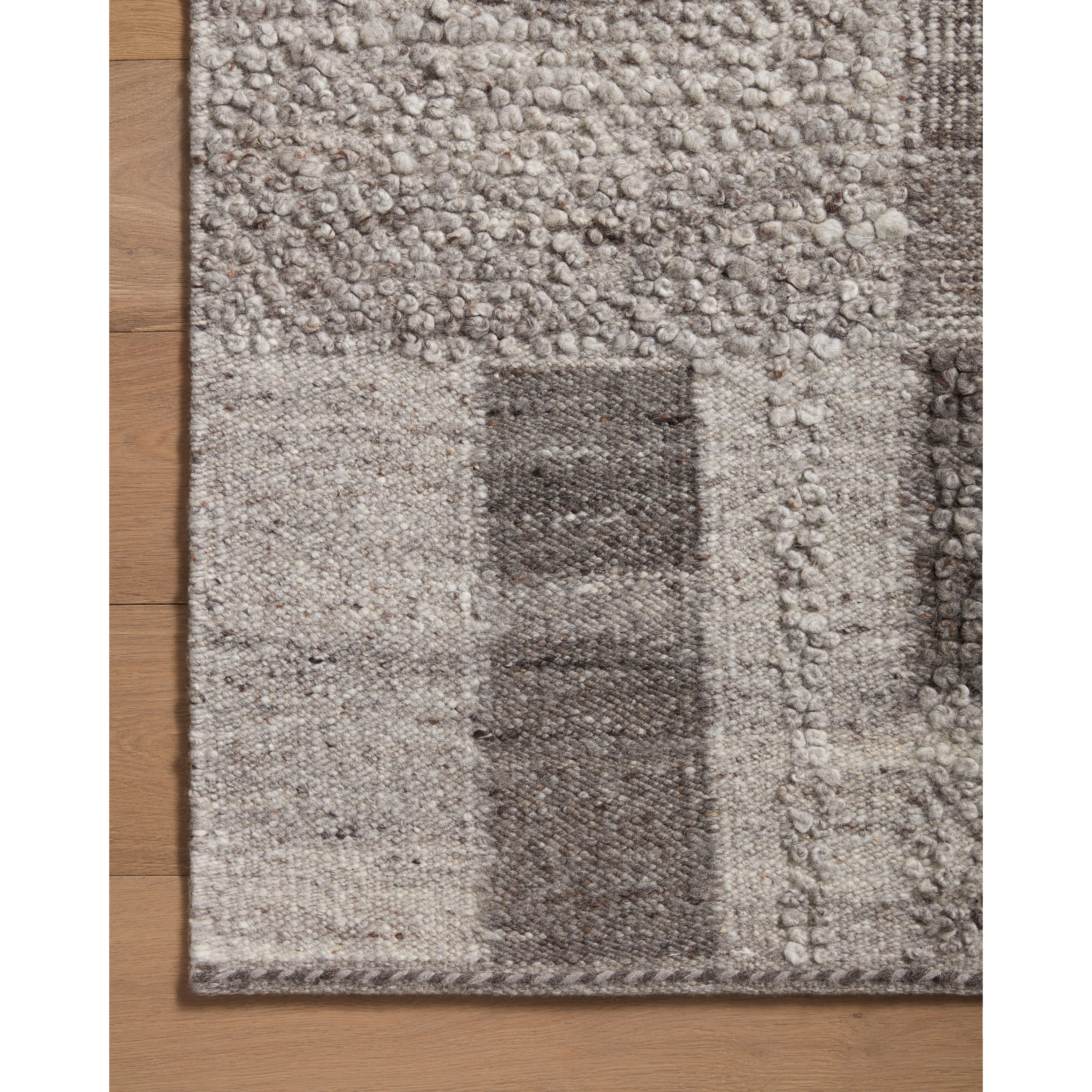 Featuring Manfred Charcoal / Dove Hand-Knotted Rug by Loloi at Amethyst Home. Each area rug in the Manfred Charcoal / Dove Rug collection is meticulously hand-knotted with a technique that creates a high-low texture, adding visual depth and movement. The rug’s patchwork design is casually sophisticated, fitting into living rooms, bedrooms, and dens—anywhere a . Amethyst Home provides interior design, new home construction design consulting, vintage area rugs, and lighting in the Dallas metro area.