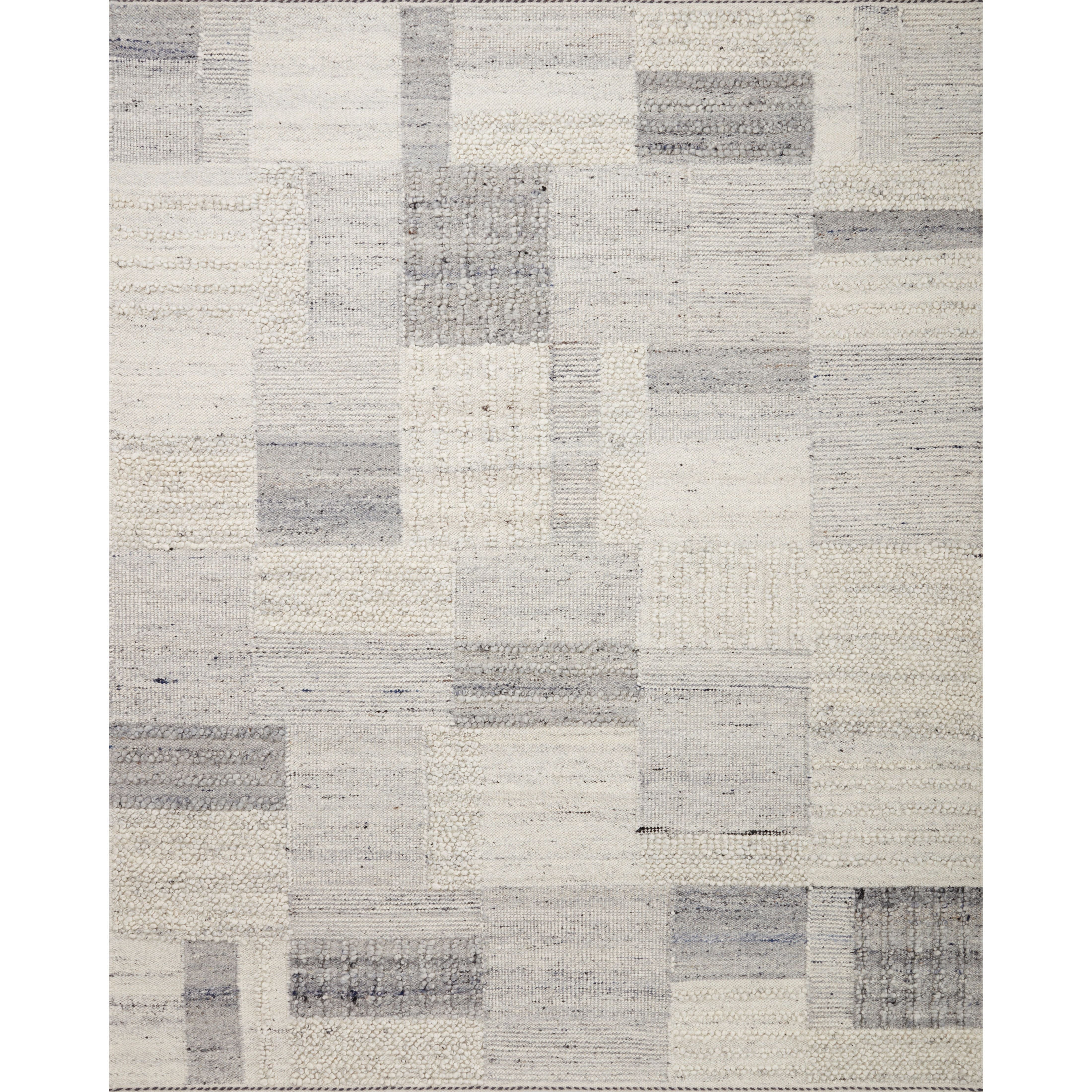 Featuring Manfred Slate / Mist Hand-Knotted Rug by Loloi at Amethyst Home. Each area rug in the Manfred Slate / Mist rug collection is meticulously hand-knotted with a technique that creates a high-low texture, adding visual depth and movement. The rug’s patchwork design is casually sophisticated, fitting into living rooms, bedrooms, and dens—anywhere a t. Amethyst Home provides interior design, new home construction design consulting, vintage area rugs, and lighting in the Kansas City metro area.