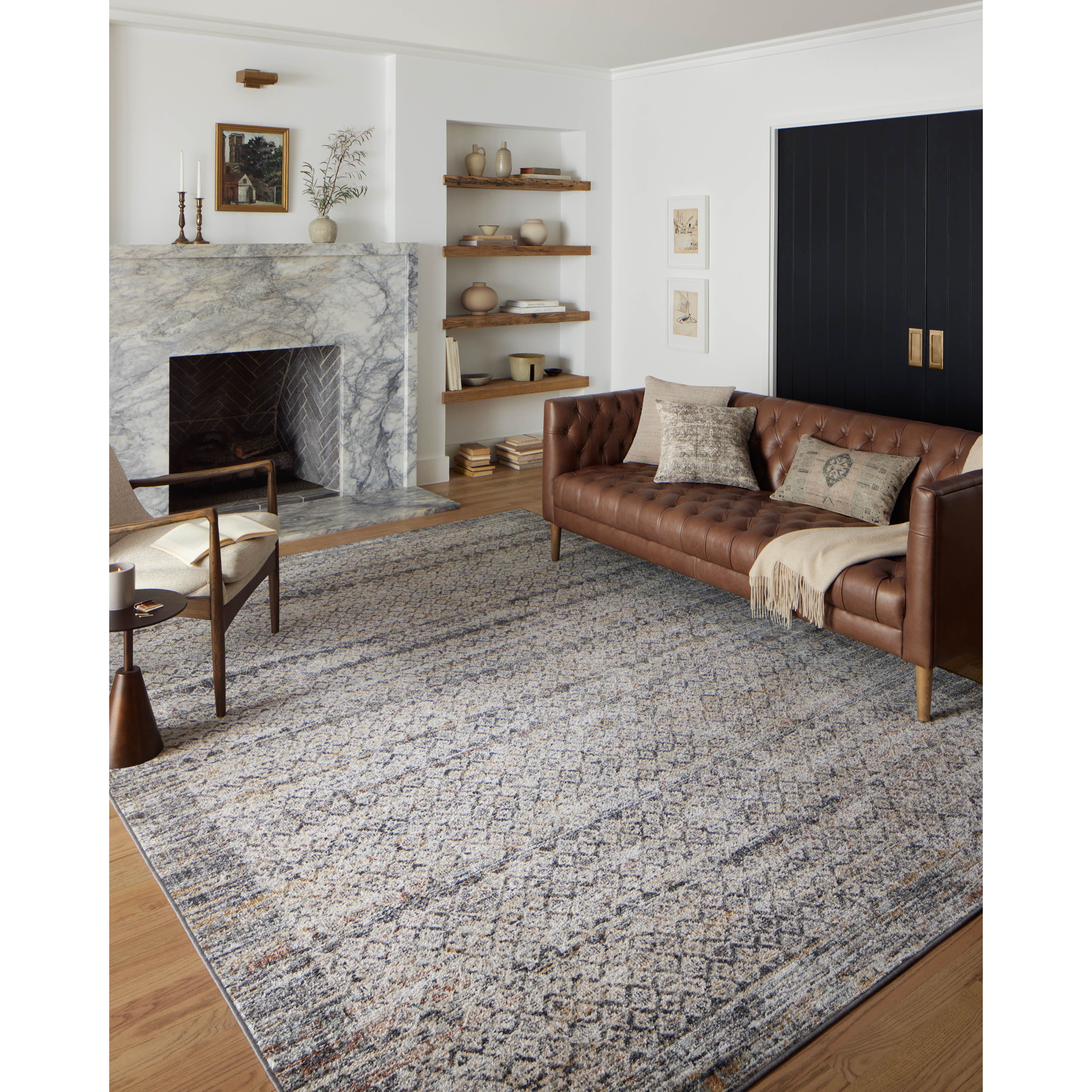 Featuring Monroe Grey / Multi Rug by Loloi at Amethyst Home. Inspired by antique Turkish Oushak carpets with large-scale motifs, the Monroe Grey / Multi Rug modernizes the traditional design in neutral palettes, many of which have black details that anchor the rug in the room. Monroe is power-loomed of 100% polypropylene for easy care and reliable durabi. Amethyst Home provides interior design, new home construction design consulting, vintage area rugs, and lighting in the Laguna Beach metro area.