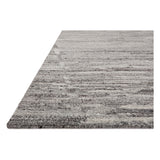 Featuring Raquel Grey / Stone Rug by Loloi at Amethyst Home. The Raquel Collection exemplifies what makes a hand-knotted rug so unique. Each area rug has a ribbed texture and subtle striping created by the artisan’s cut-and-loop technique. Raquel features an organic, asymmetrical linear pattern in an airy, neutral palette. With both an elevated look and fee. Amethyst Home provides interior design, new home construction design consulting, vintage area rugs, and lighting in the Charlotte metro area.