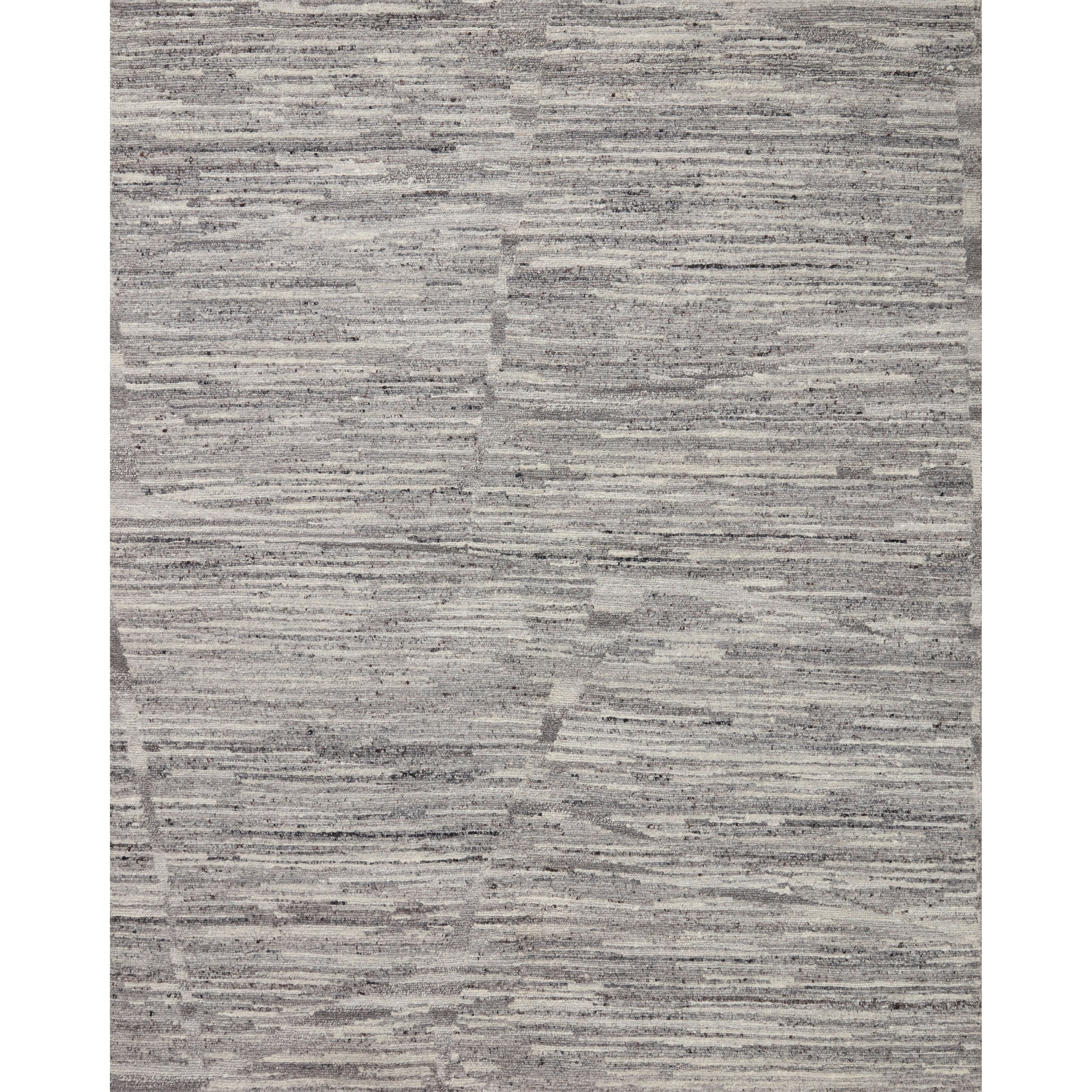 Featuring Raquel Grey / Stone Rug by Loloi at Amethyst Home. The Raquel Collection exemplifies what makes a hand-knotted rug so unique. Each area rug has a ribbed texture and subtle striping created by the artisan’s cut-and-loop technique. Raquel features an organic, asymmetrical linear pattern in an airy, neutral palette. With both an elevated look and feel, t. Amethyst Home provides interior design, new home construction design consulting, vintage area rugs, and lighting in the Tampa metro area.