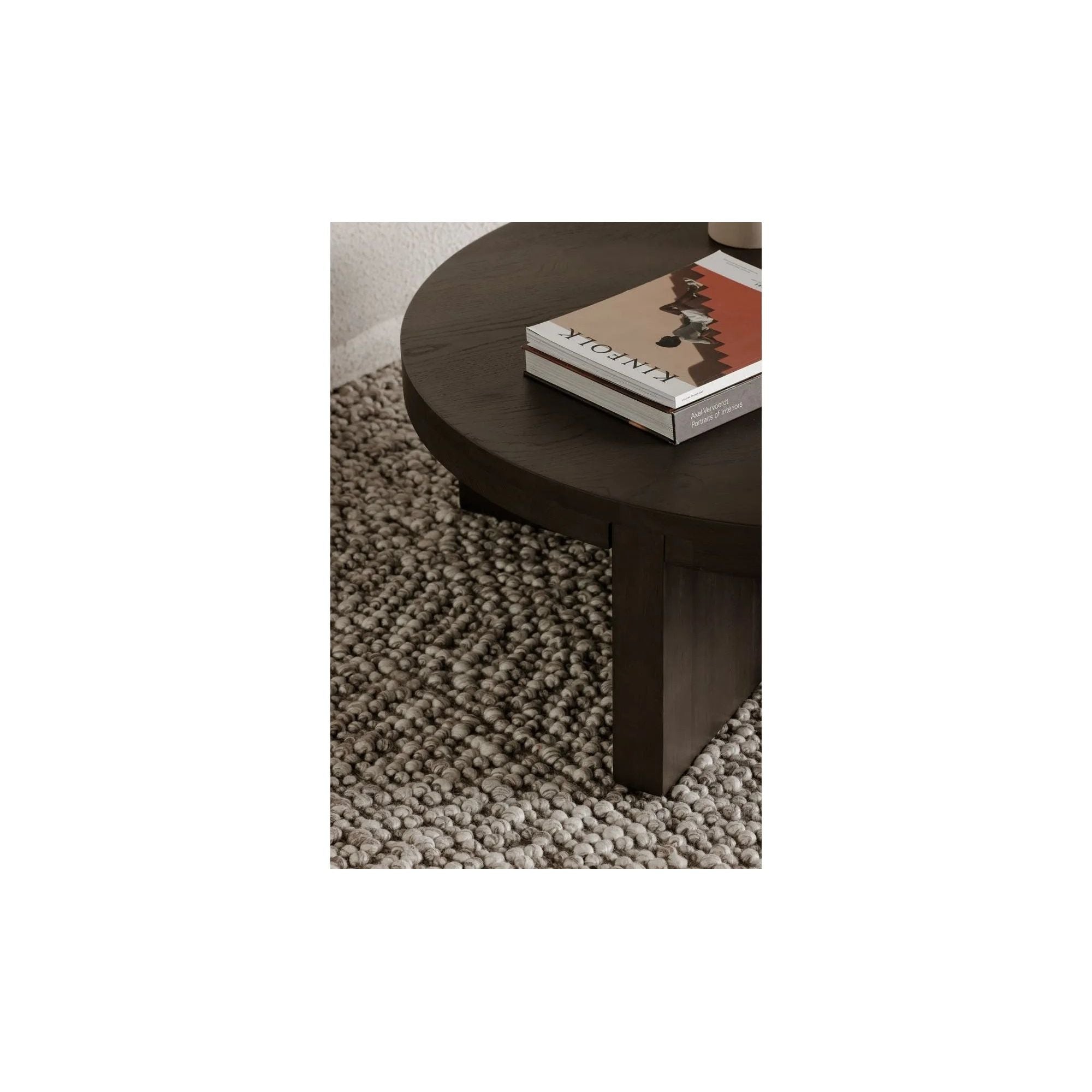 Bringing new levels of connection to interior living, the Folke round coffee table is a showcase of nature’s majesty. Entirely constructed from solid brown oak, the individual components of this piece are beautifully shaped and joined, coming together in absolute harmony. Natural woodgrain and artisanal craft make Folke an all-natural standout Amethyst Home provides interior design, new home construction design consulting, vintage area rugs, and lighting in the Washington metro area.