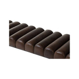 With its channel detailing that adds a touch of softness to the robust metal frame, the distinguished Harrison bench embodies clean lines and a modern sensibility. Crafted with exceptional attention to detail, it effortlessly blends into any space, making a statement wherever it resides, be it the entryway, living room or bedroom. Amethyst Home provides interior design, new home construction design consulting, vintage area rugs, and lighting in the Boston metro area.