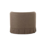 The Maren swivel chair exudes a soft, feminine aesthetic, upholstered in a warm, neutral fabric and featuring a playful yet refined box pleat base reminiscent of vintage finesse, straddling the line between contemporary form and traditional finish. Amethyst Home provides interior design, new home construction design consulting, vintage area rugs, and lighting in the Winter Garden metro area.