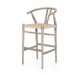 Featuring Muestra Counter + Bar Stool - Weathered Grey by Four Hands at Amethyst Home. Modern curves redefine the classic wishbone-style counter stool. Vintage white all-weather wicker is woven for a dose of fresh texture within weathered grey teak framing. Cover or store indoors during inclement weather and when not in use.
Counter Stool Overall Size: 21.5. Amethyst Home provides interior design, new home construction design consulting, vintage area rugs, and lighting in the Park City metro area.