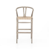 Featuring Muestra Counter + Bar Stool - Weathered Grey by Four Hands at Amethyst Home. Modern curves redefine the classic wishbone-style counter stool. Vintage white all-weather wicker is woven for a dose of fresh texture within weathered grey teak framing. Cover or store indoors during inclement weather and when not in use.
Counter Stool Overall Size: 21.. Amethyst Home provides interior design, new home construction design consulting, vintage area rugs, and lighting in the Scottsdale metro area.