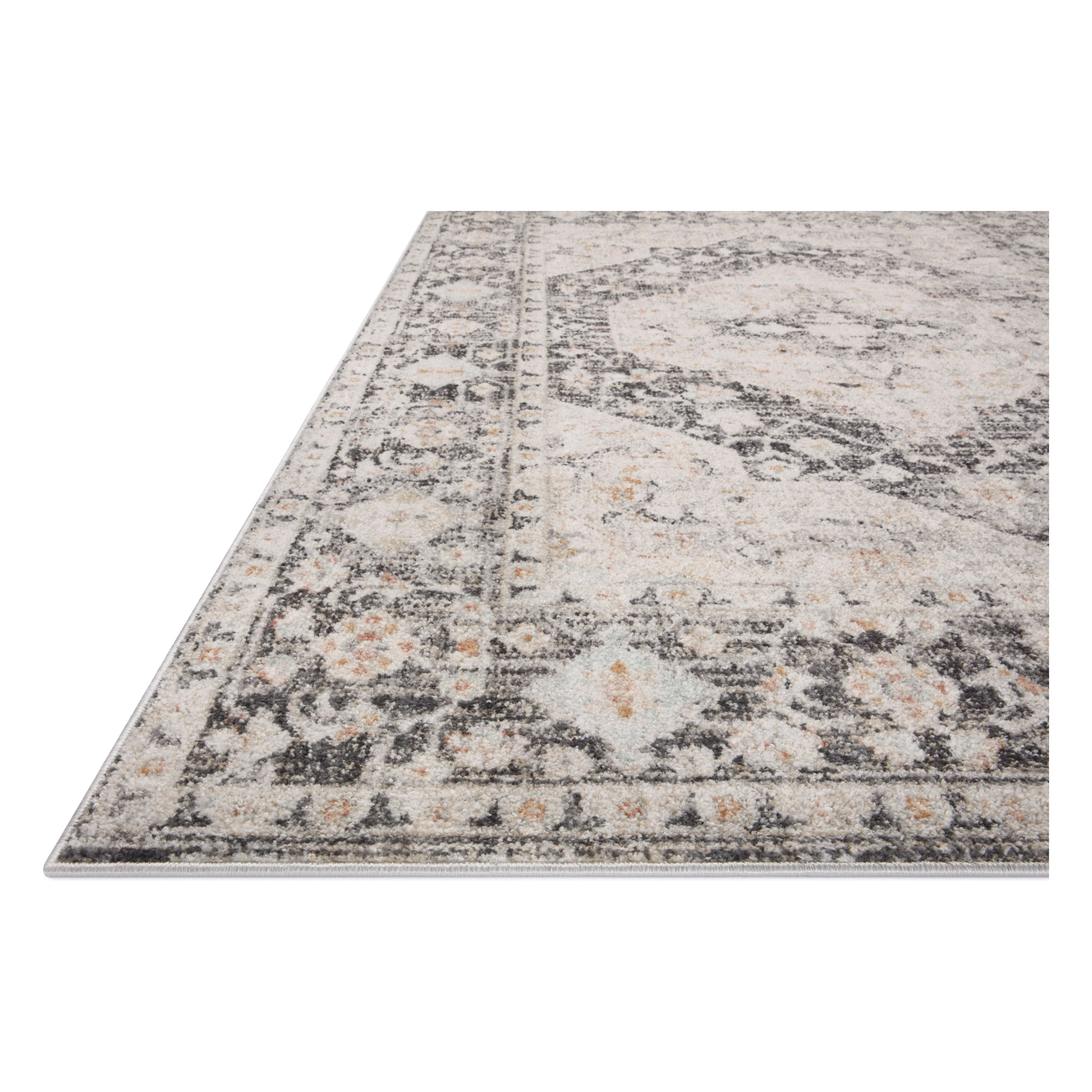 Featuring Monroe Charcoal / Multi Rug by Loloi at Amethyst Home. Inspired by antique Turkish Oushak carpets with large-scale motifs, the Monroe Charcoal / Multi Rug modernizes the traditional design in neutral palettes, many of which have black details that anchor the rug in the room. Monroe is power-loomed of 100% polypropylene for easy care and reliable durability. Made in Turk. Amethyst Home provides interior design, new construction, custom furniture, and area rugs in the San Diego metro area.