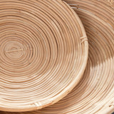 This oversized low bowl cane rattan set of two are stacked, not woven creating a more substantial basket. With a light and refined look, cane rattan is at home in the modern to transitional space. Amethyst Home provides interior design, new construction, custom furniture, and area rugs in the Miami metro area.