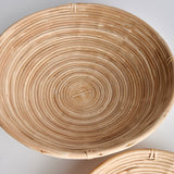 This oversized low bowl cane rattan set of two are stacked, not woven creating a more substantial basket. With a light and refined look, cane rattan is at home in the modern to transitional space. Amethyst Home provides interior design, new construction, custom furniture, and area rugs in the Washington metro area.