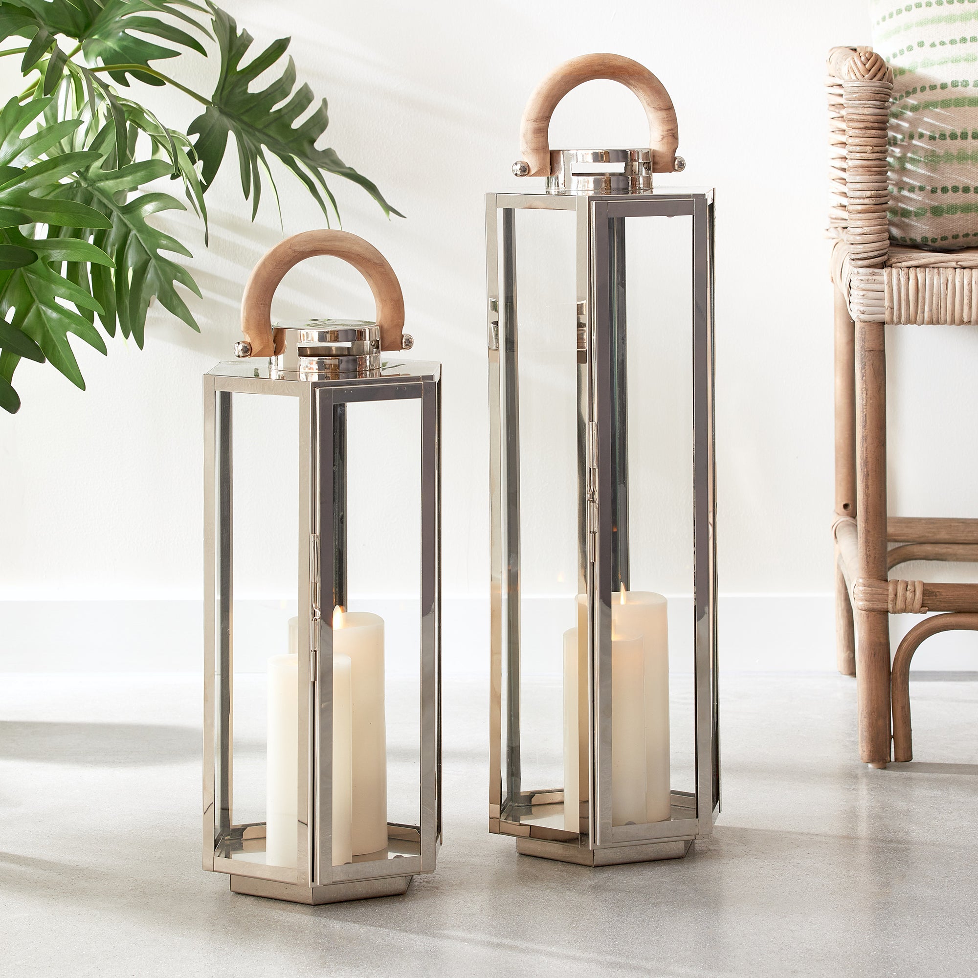 This six panel lantern is made of stainless steel and natural teak handles. Impressive in scale, it is a great accent along the mantle, or on an entry console. Amethyst Home provides interior design, new construction, custom furniture, and area rugs in the Omaha metro area.