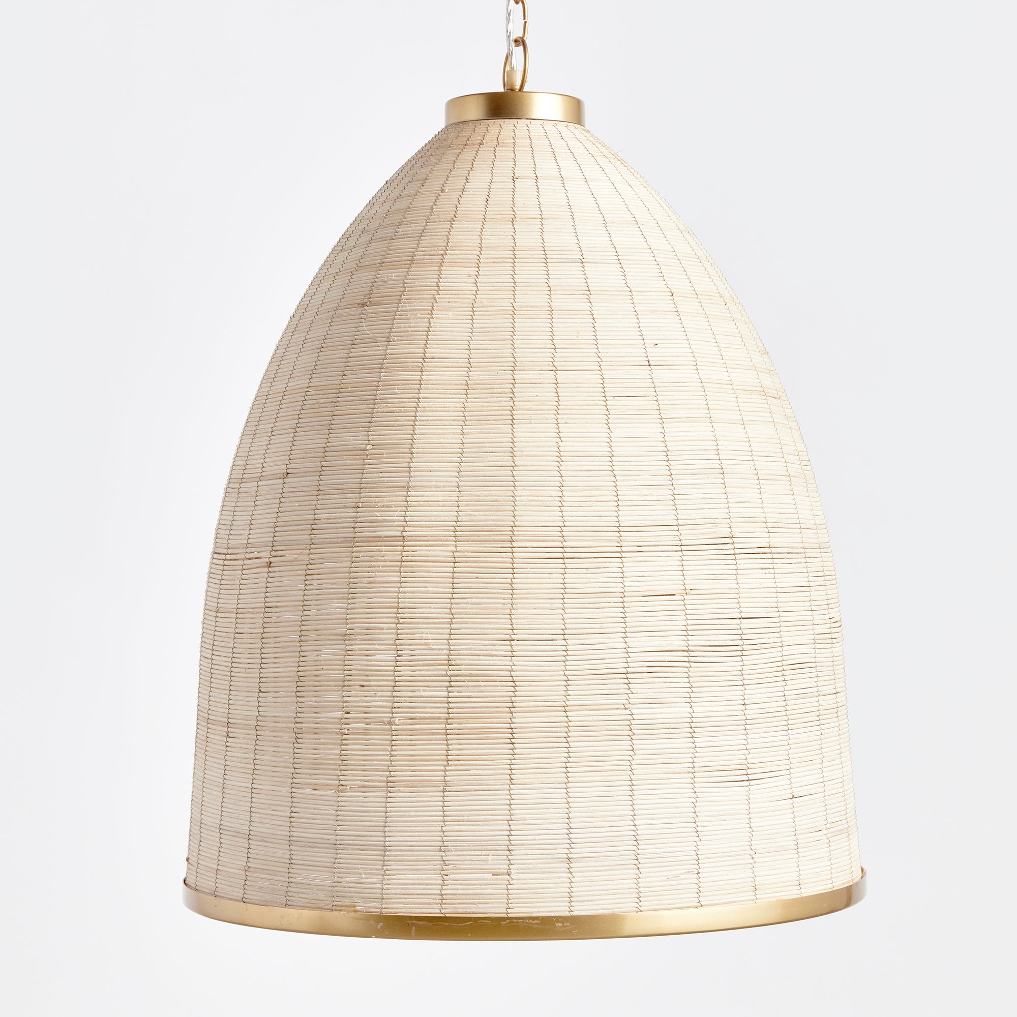 Woven in a natural cane rattan, with subtle variations in color making each one truly unique, this pendant is an instant classic. The brass details on the top and along the bottom rim make it decidedly more refined. And talk about scale! A show-stopping choice for kitchen island, entry foyer or hallway. Amethyst Home provides interior design, new construction, custom furniture, and area rugs in the Portland metro area.