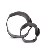 A matte black finish and rough, organic repeated circular shapes make these cast aluminum sculptures unique. A contemporary touch for home office or den on book shelf, mantle or console. Amethyst Home provides interior design, new construction, custom furniture, and area rugs in the Laguna Beach metro area.