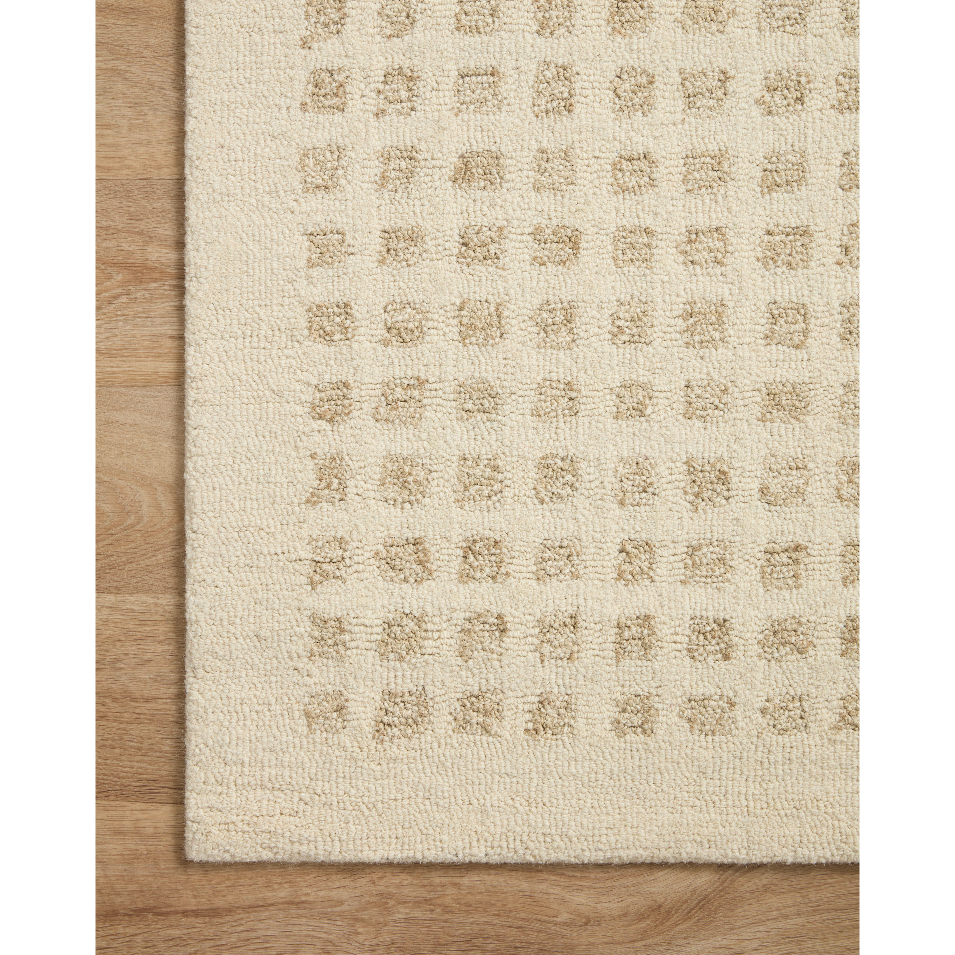 Featuring Polly Chris Loves Julia x Loloi Ivory / Natural Rug by Loloi at Amethyst Home. Hand-tufted of wool and jute pile, the Polly Ivory / Natural rug for Chris Loves Julia x Loloi brings a fresh take on modern yet classic designs. With striking gridded designs toned down by a neutral color palette, Polly is a timeless choice for any room. Pol. Amethyst Home provides interior design, new construction, custom furniture, and rugs for the Winter Park, Winter Garden, and Orlando Florida metro area.