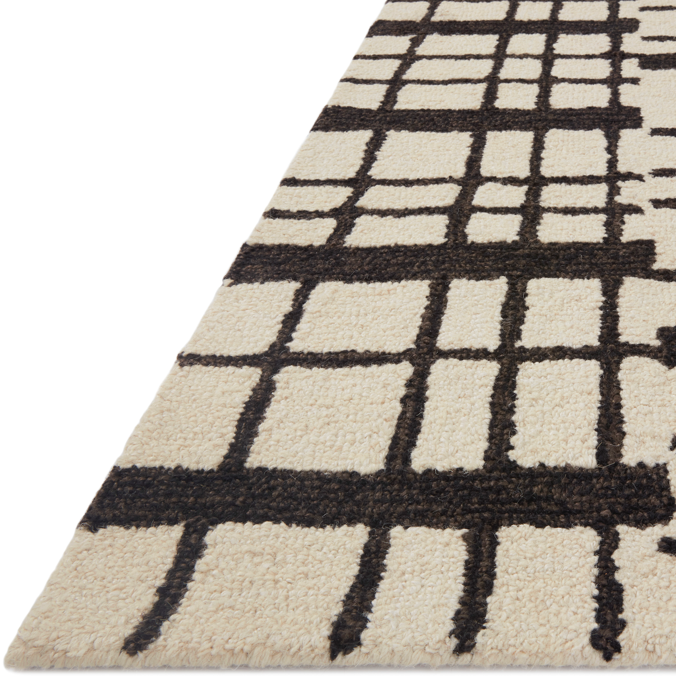 Featuring Polly Chris Loves Julia x Loloi Black / Ivory Rug by Loloi at Amethyst Home. Hand-tufted of wool and jute pile, the Polly Black / Ivory rug for Chris Loves Julia x Loloi brings a fresh take on modern yet classic designs. With striking gridded designs toned down by a neutral color palette, Polly is a timeless choice for any room. Polly is also GoodWeave certified, ensuring. Amethyst Home provides interior design, new construction, custom furniture, and rugs for the Kansas City metro area.