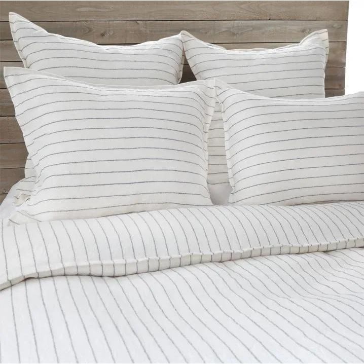 Our Blake Collection features an interwoven stripe texture, giving a modern refresh to a traditional stripe. Our duvet cover and shams are hand-loomed by artisans and the linen is washed for a relaxed lived-in look.The mélange of textures within this woven bedding elevates your space into a sophisticated, yet relaxing retreat. Amethyst Home provides interior design, new home construction design consulting, vintage area rugs, and lighting in the Kansas City metro area.
