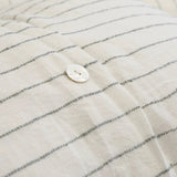 Our Blake Collection features an interwoven stripe texture, giving a modern refresh to a traditional stripe. Our duvet cover and shams are hand-loomed by artisans and the linen is washed for a relaxed lived-in look.The mélange of textures within this woven bedding elevates your space into a sophisticated, yet relaxing retreat. Amethyst Home provides interior design, new home construction design consulting, vintage area rugs, and lighting in the Park City metro area.