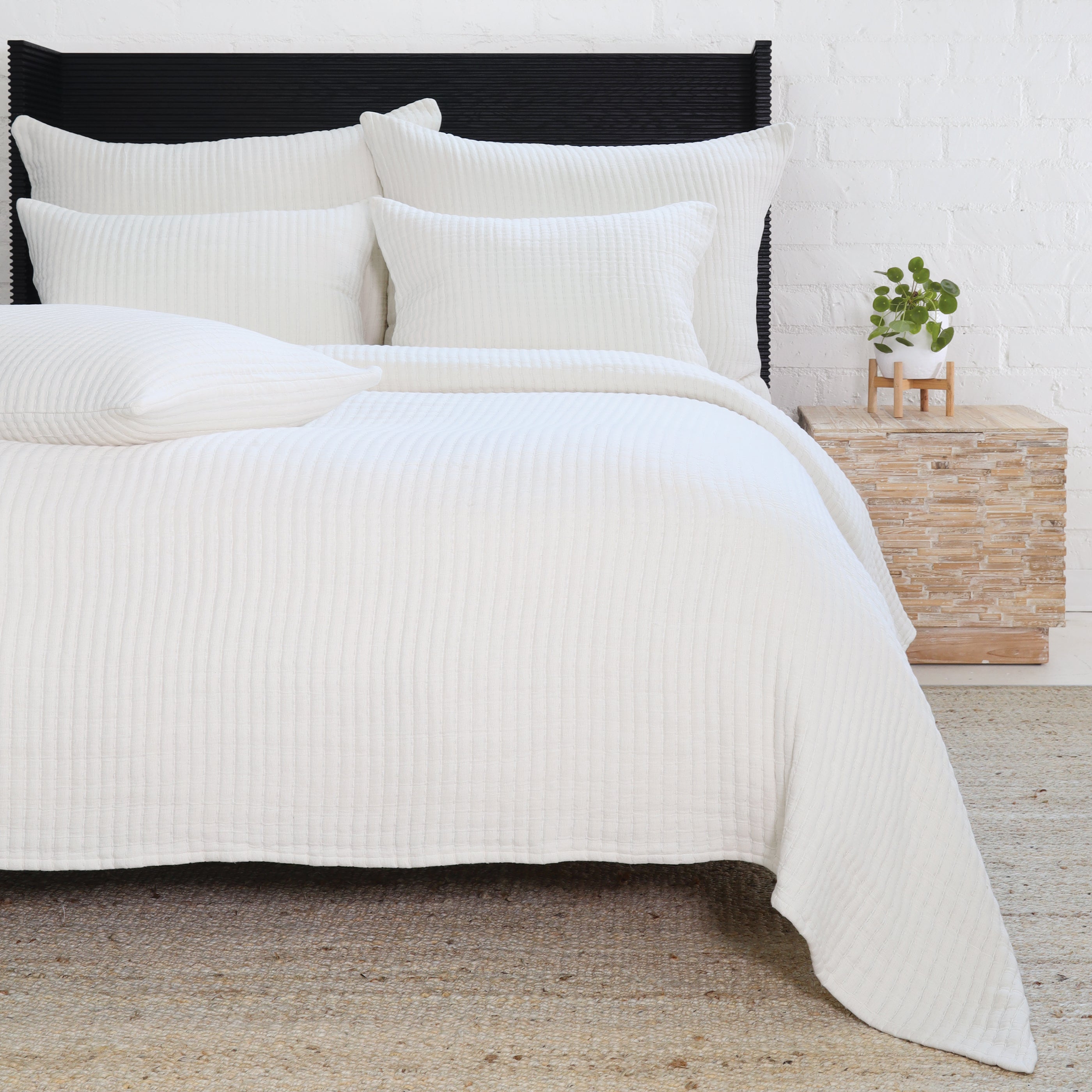 Add textural interest to your bed with the Vancouver Coverlet collection. Made of a lightweight stonewashed cotton gauze with an interwoven ivory stripe, it is the perfect addition to your bed to create a relaxing space. Amethyst Home provides interior design, new construction, custom furniture, and area rugs in the Winter Garden metro area.
