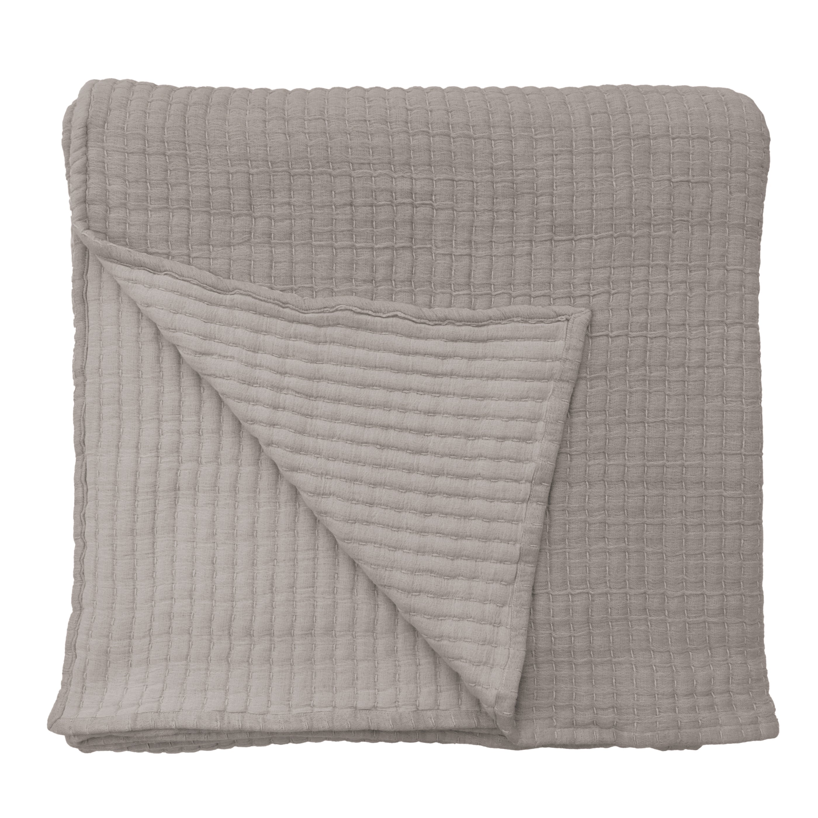 Add textural interest to your bed with the Vancouver Coverlet collection. Made of a lightweight stonewashed cotton gauze with an interwoven ivory stripe, it is the perfect addition to your bed to create a relaxing space. Amethyst Home provides interior design, new construction, custom furniture, and area rugs in the Monterey metro area.