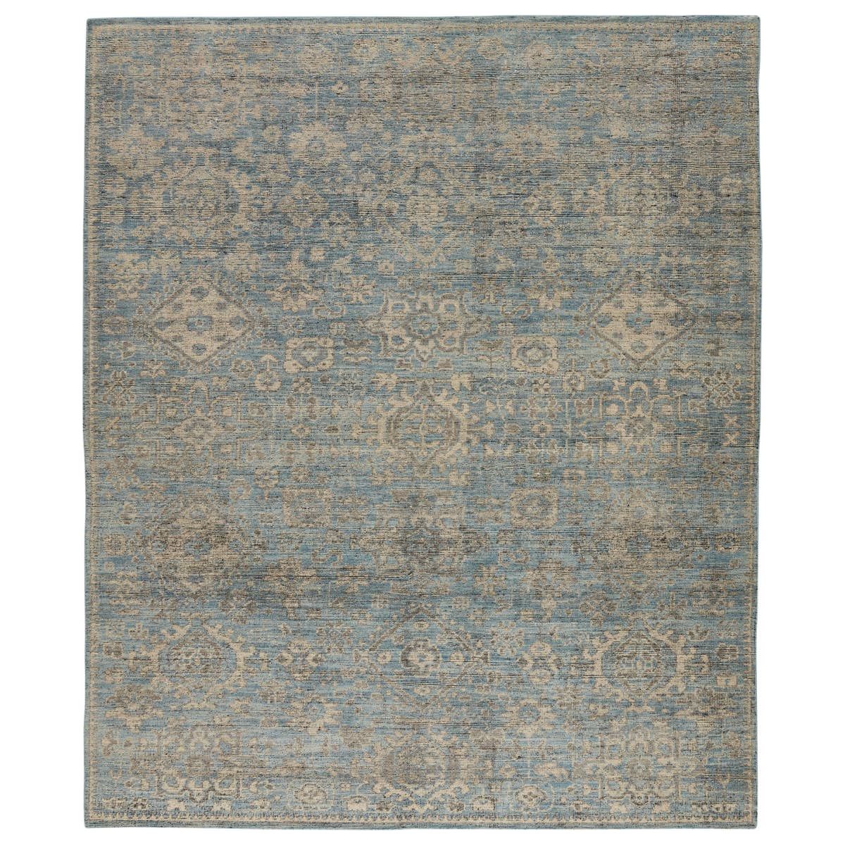 Featuring Rhapsody Faena Hand-Knotted Rug by Jaipur Living at Amethyst Home. The Rhapsody Faena Area Rug features heirloom-quality designs of stunningly abrashed Old World patterns.  The Faena hand-knotted rug boasts a beautifully washed medallion motif with elegant floral accents. The light blue, cream, and gray palette grounds transitional spaces with gr.  Amethyst Home provides interior design, new home construction design consulting, vintage area rugs, and lighting in the Charlotte metro area.
