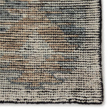 Featuring Rize Nakoda Hand-Knotted Rug by Jaipur Living at Amethyst Home. The Rize Nakoda Area Rug offers intricate and delicately designed global patterns to the modern home. A dynamic tribal motif creates an all-over design on the artistically distressed Nakoda area rug. In a black, tan, white, and blue colorway, this durable hand-knotted wool accent blend.  Amethyst Home provides interior design, new home construction design consulting, vintage area rugs, and lighting in the Seattle metro area.