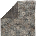 Featuring Rize Nakoda Hand-Knotted Rug by Jaipur Living at Amethyst Home. The Rize Nakoda Area Rug offers intricate and delicately designed global patterns to the modern home. A dynamic tribal motif creates an all-over design on the artistically distressed Nakoda area rug. In a black, tan, white, and blue colorway, this durable hand-knotted wool accent blend.  Amethyst Home provides interior design, new home construction design consulting, vintage area rugs, and lighting in the Houston metro area.