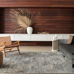 Featuring Rize Nakoda Hand-Knotted Rug by Jaipur Living at Amethyst Home. The Rize Nakoda Area Rug offers intricate and delicately designed global patterns to the modern home. A dynamic tribal motif creates an all-over design on the artistically distressed Nakoda area rug. In a black, tan, white, and blue colorway, this durable hand-knotted wool accent.  Amethyst Home provides interior design, new home construction design consulting, vintage area rugs, and lighting in the Newport Beach metro area.